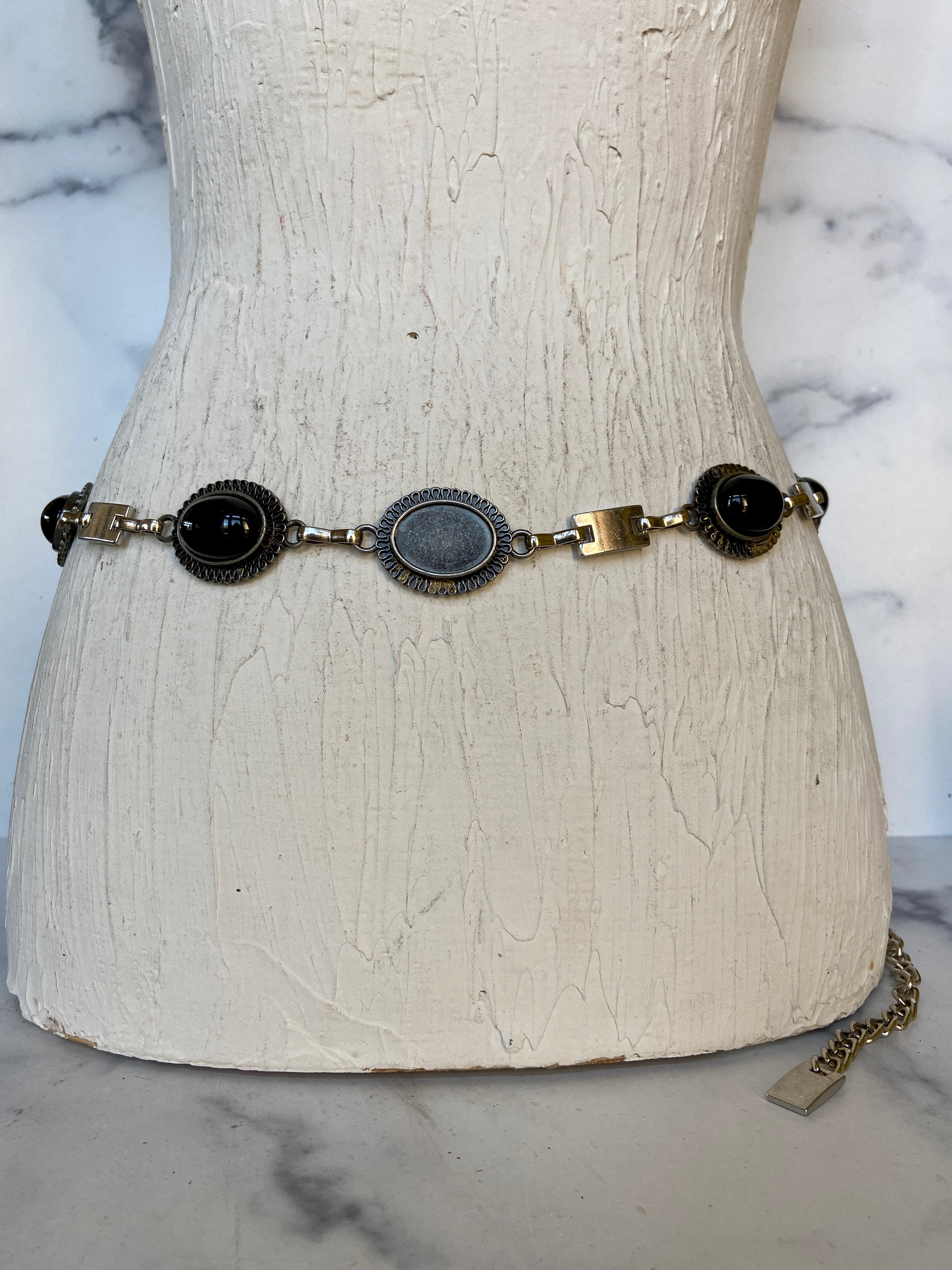 Black and vintage silver belt