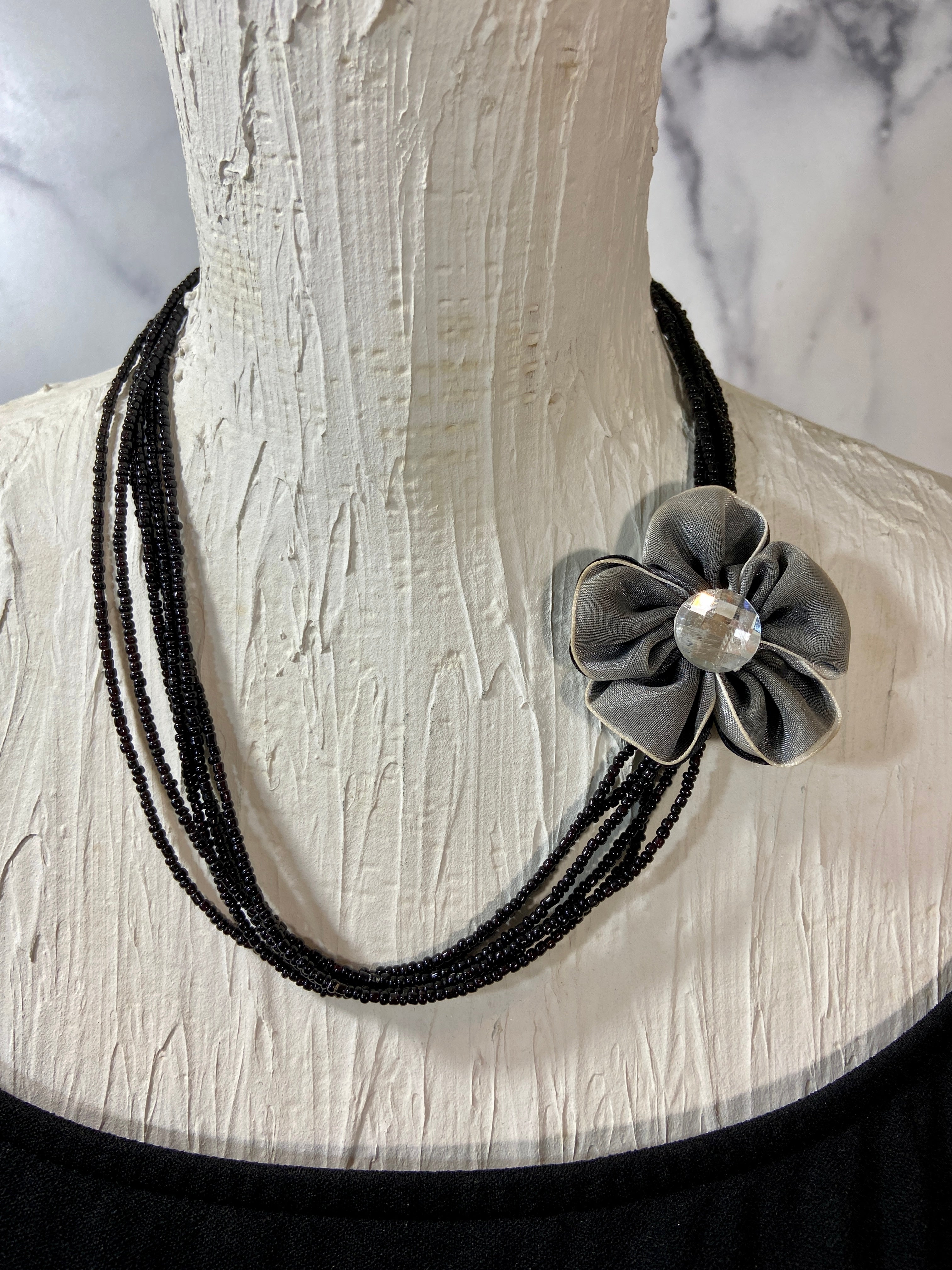 Flower in a layered beads
