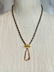 Gold and silver necklace tone