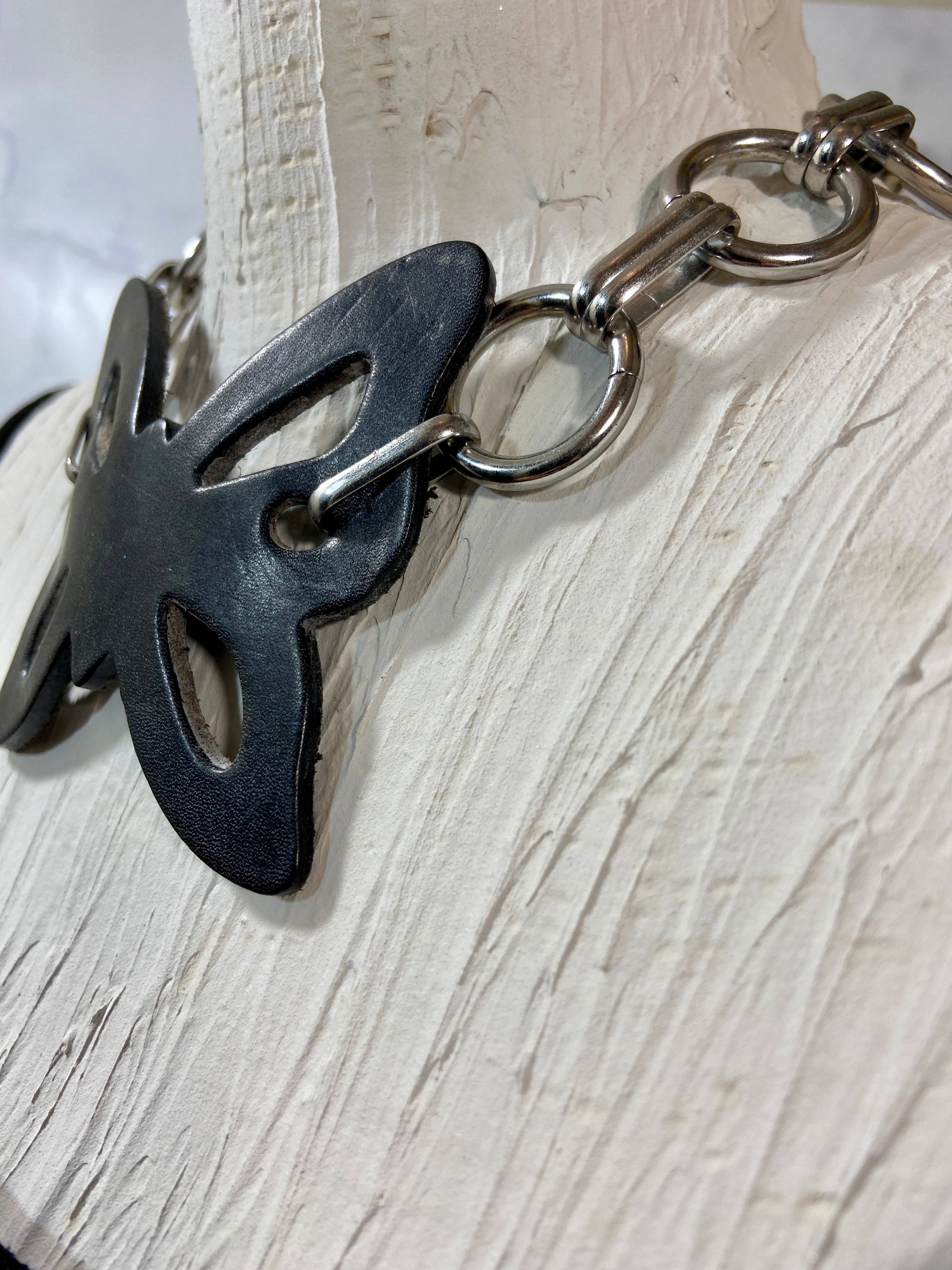 Leather butterfly in a chunky chains