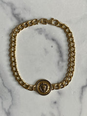 Gold lion choker