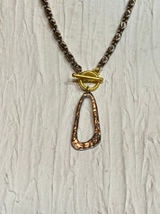 Gold and silver necklace tone