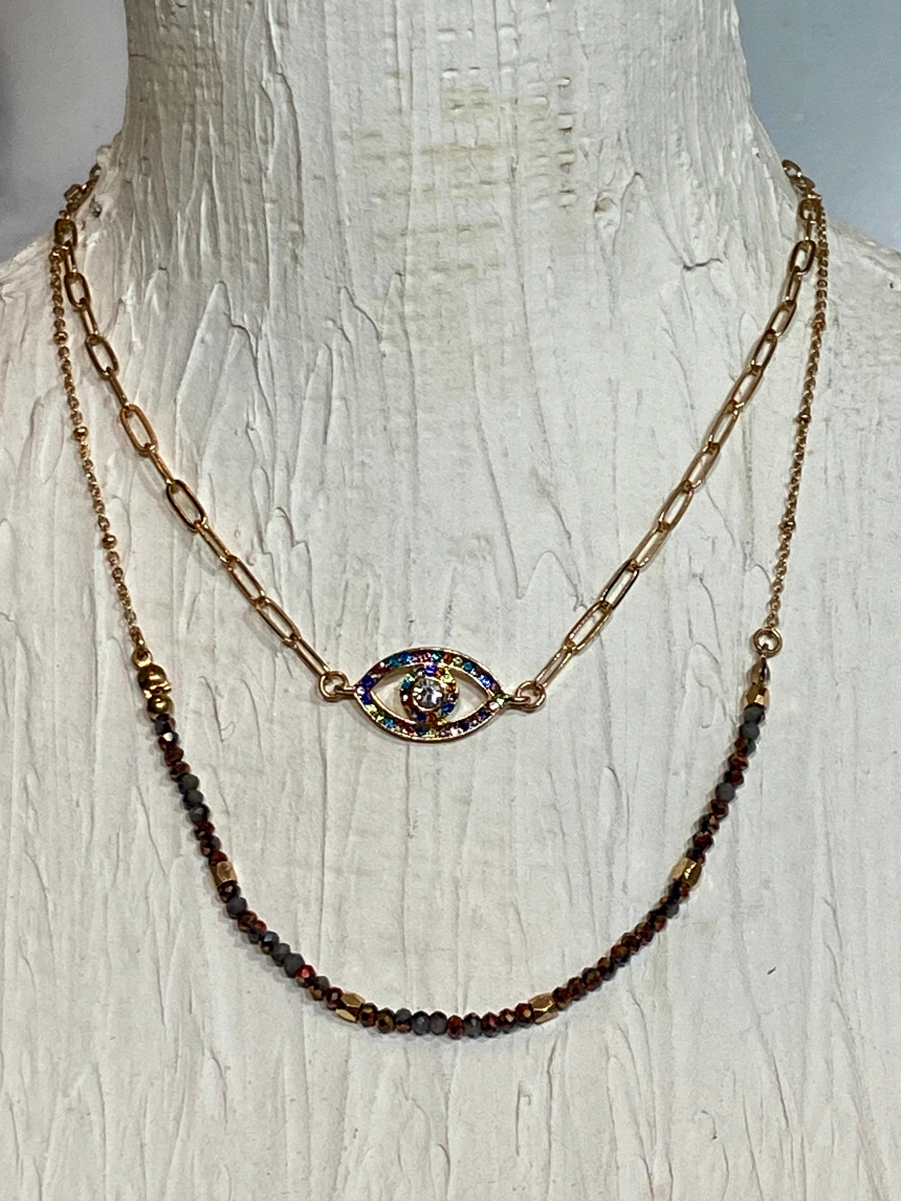 Gemstone evil eye in a chain
