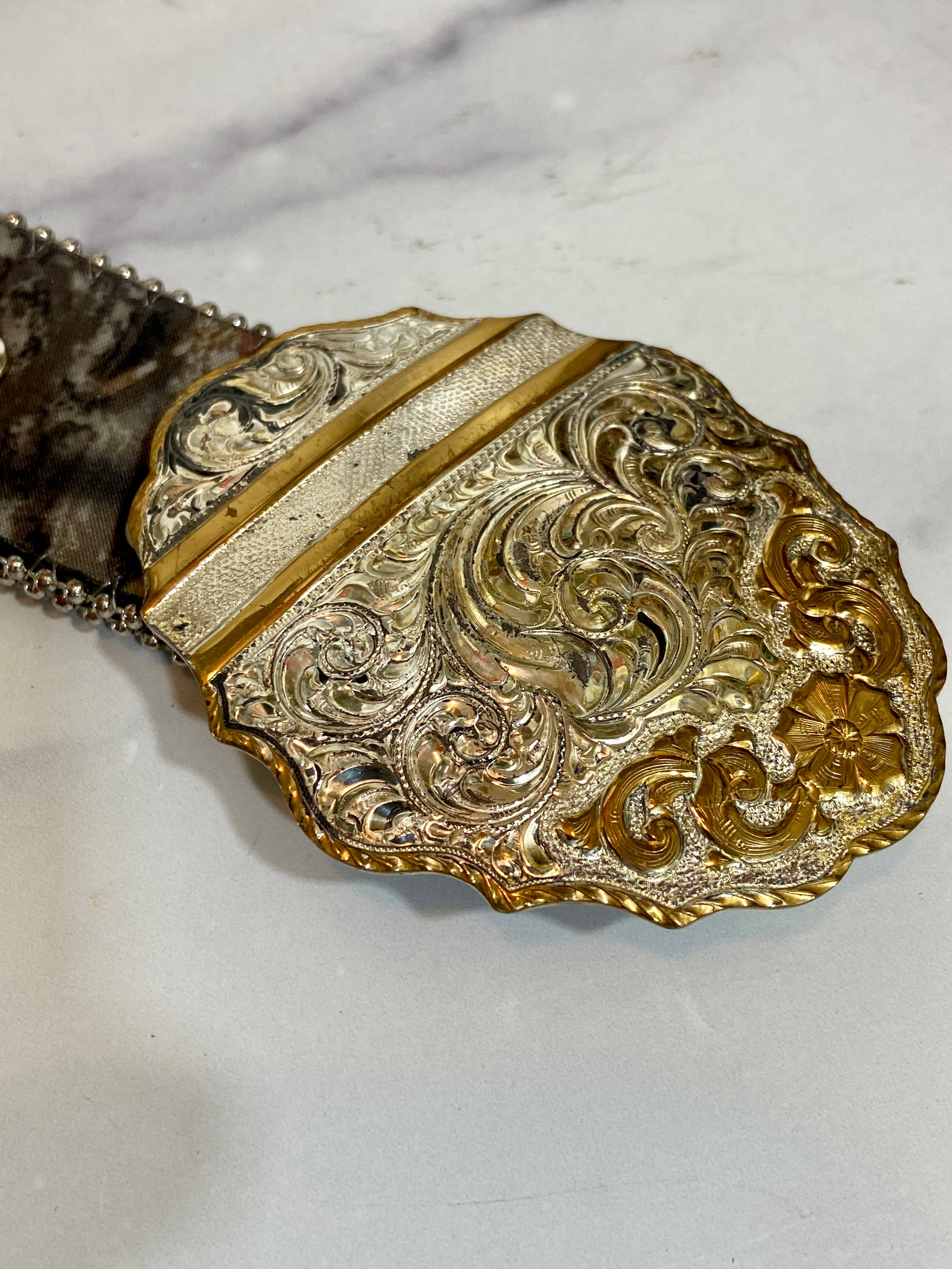 Heavy silver plate in a beautiful leather belt