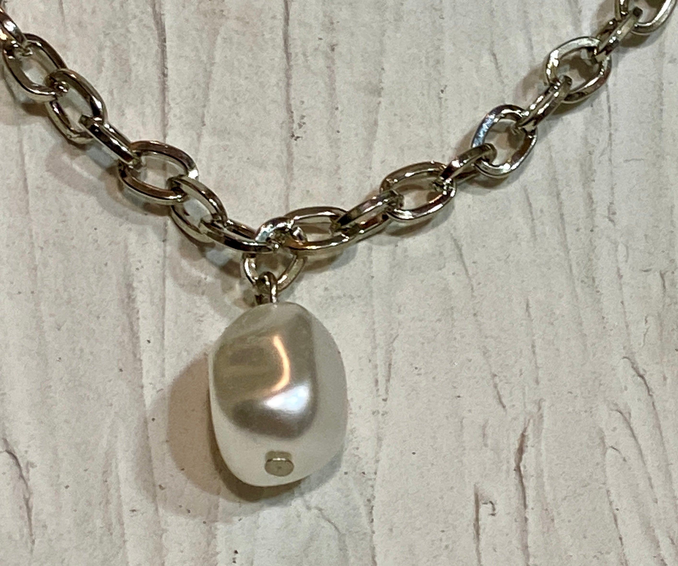 Little pearl in a chain