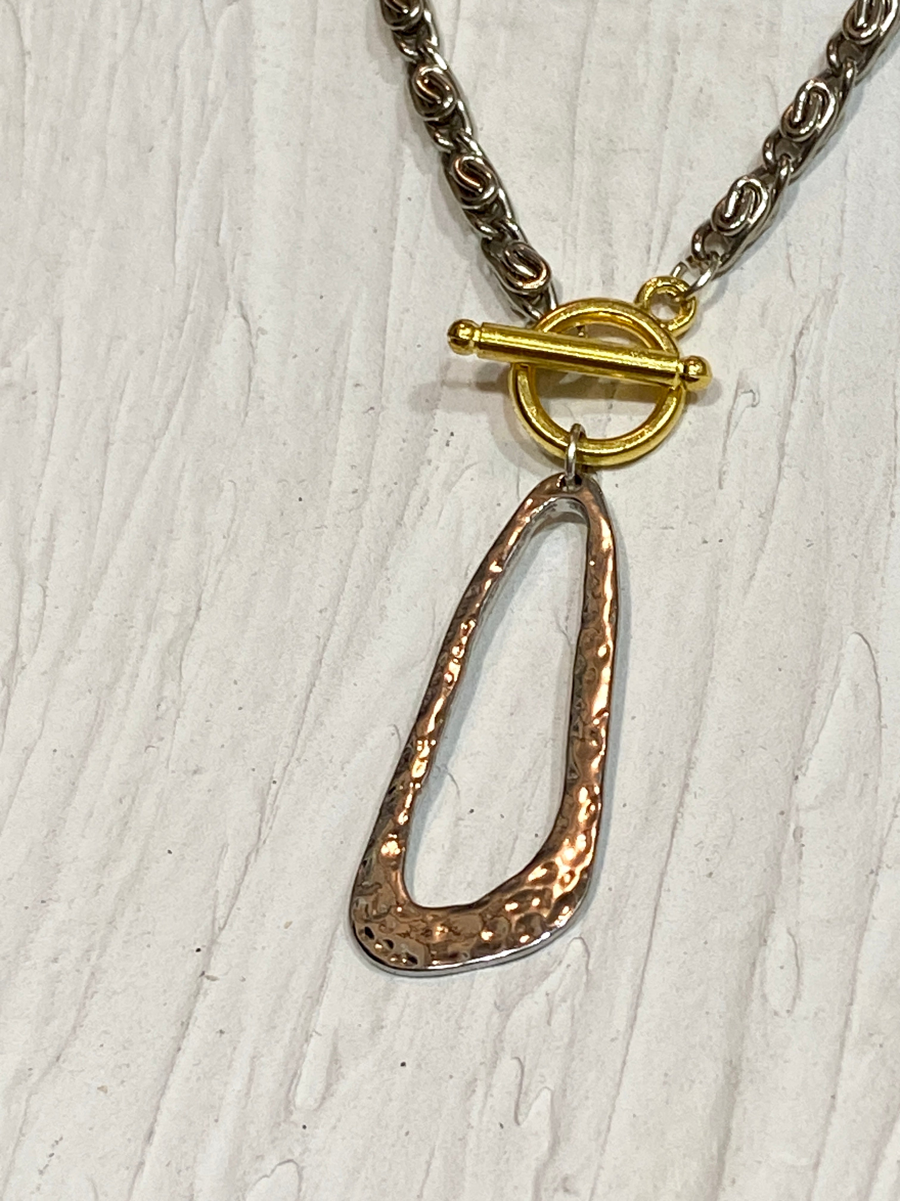 Gold and silver necklace tone
