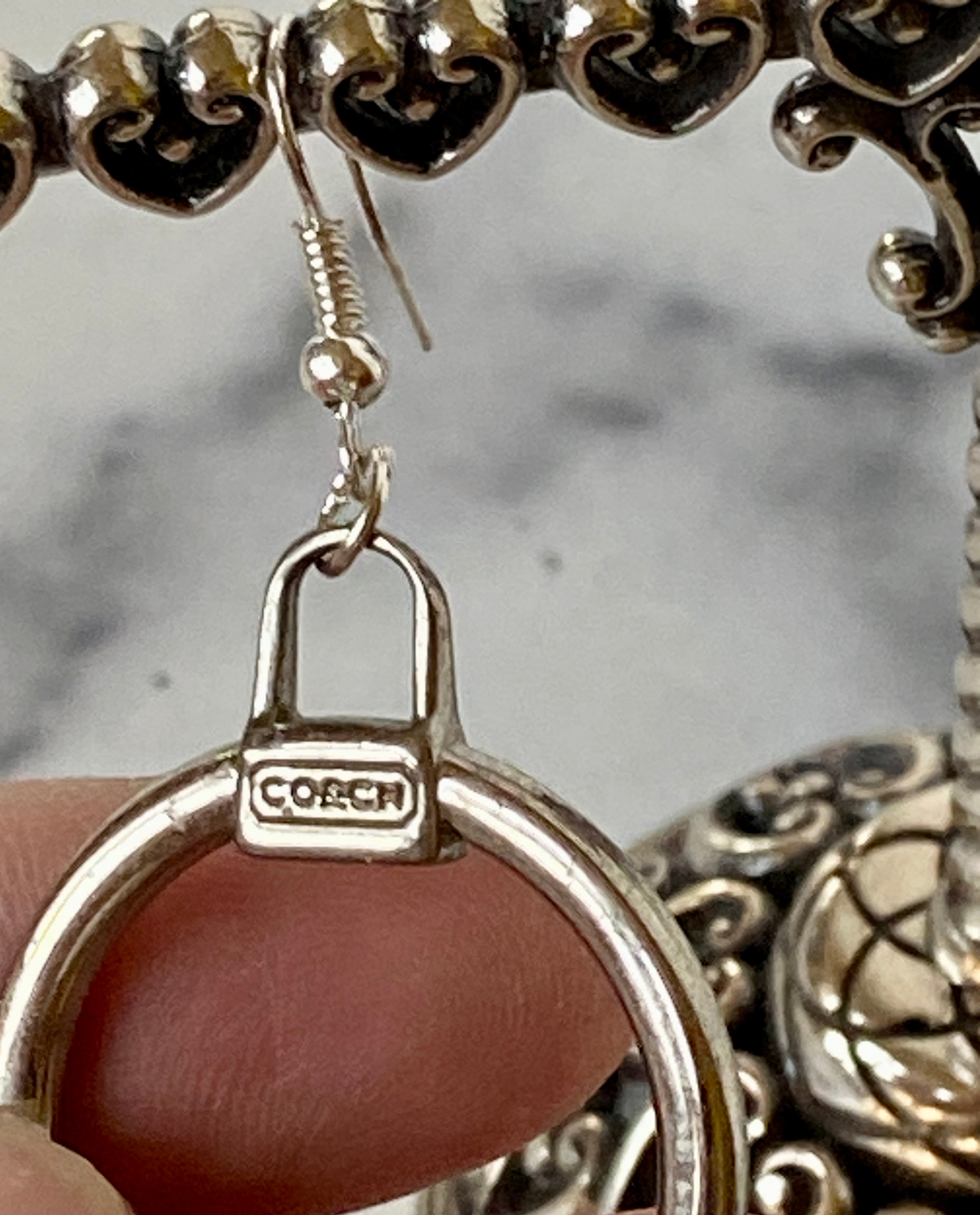 Coach earring
