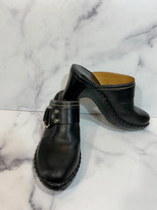 Black leather clogs