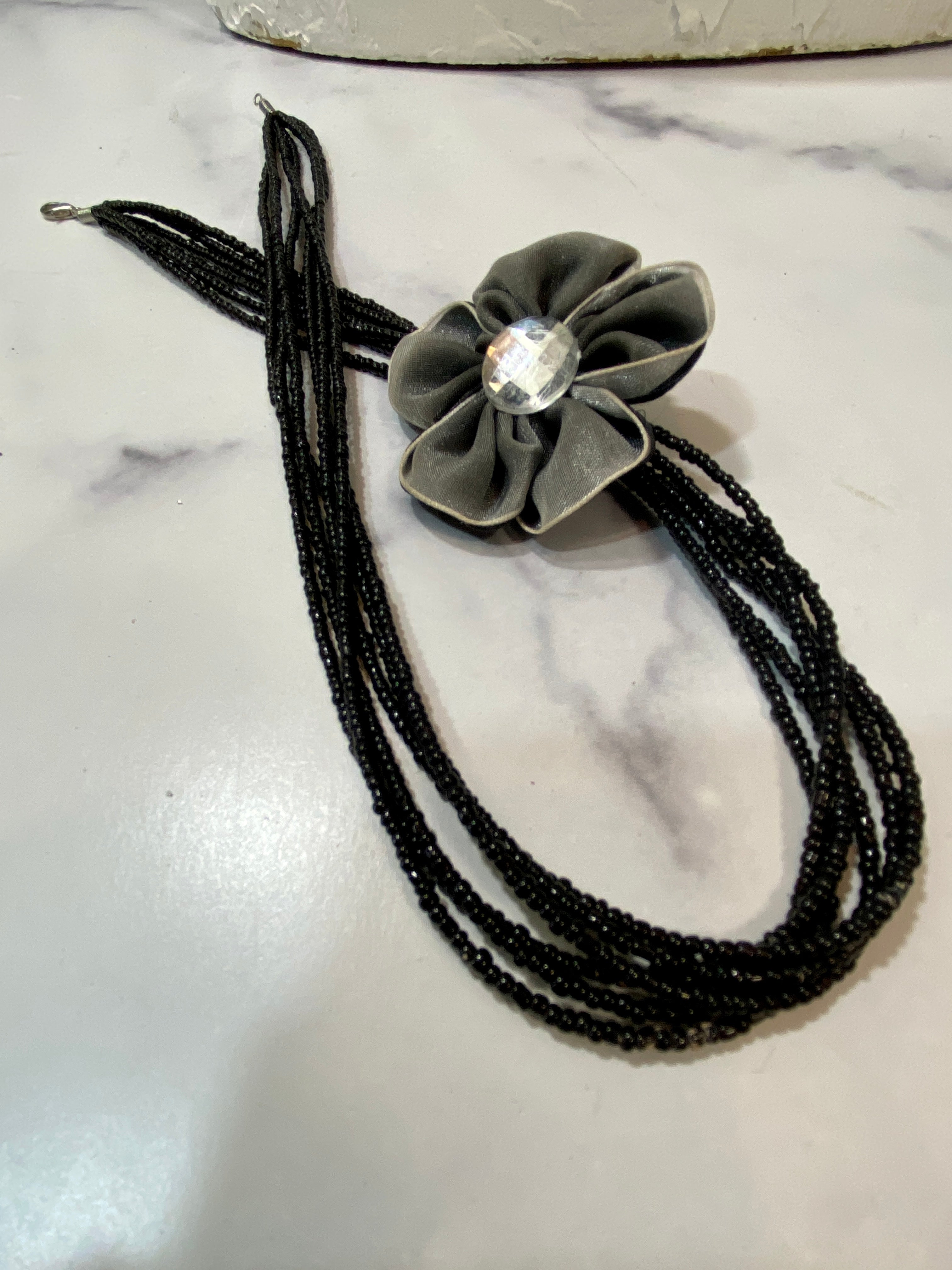 Flower in a layered beads