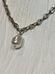 Little pearl in a chain