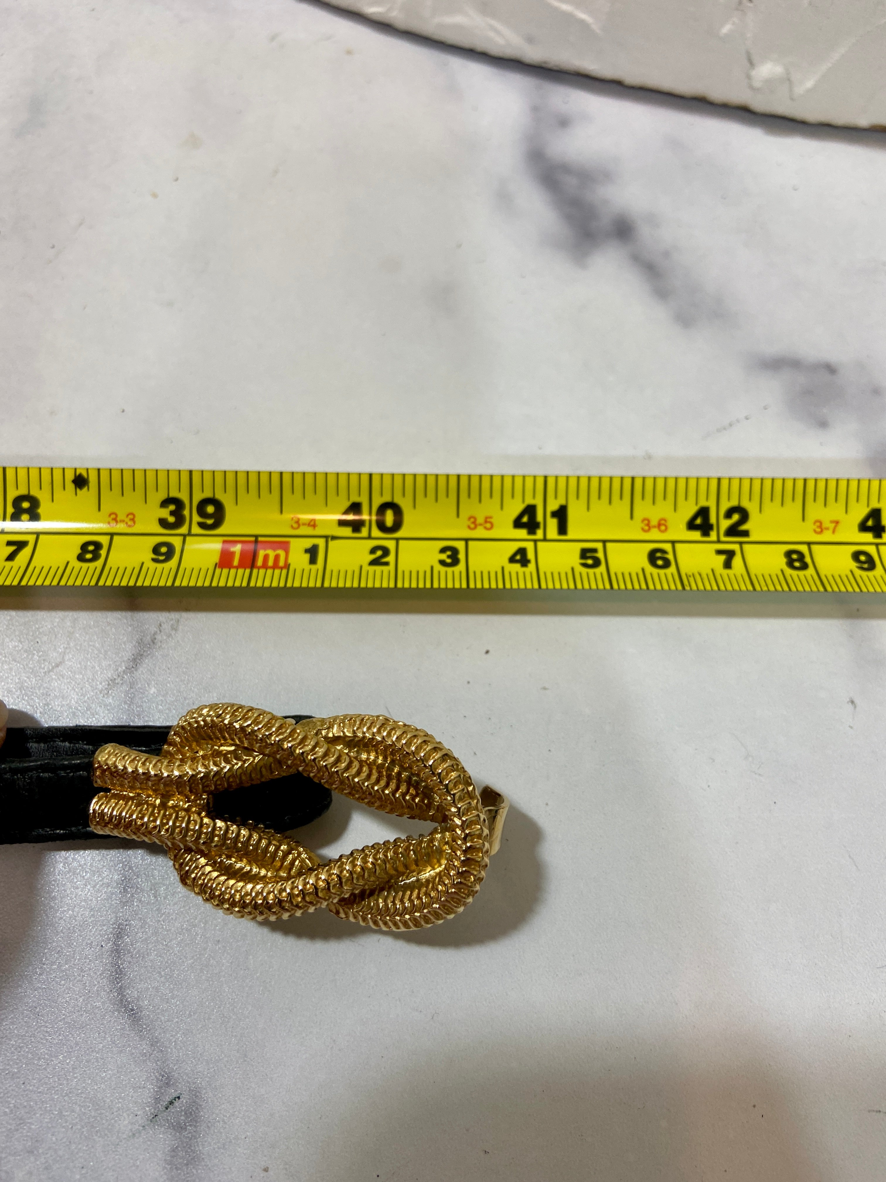 Vintage skinny gold tone black belt