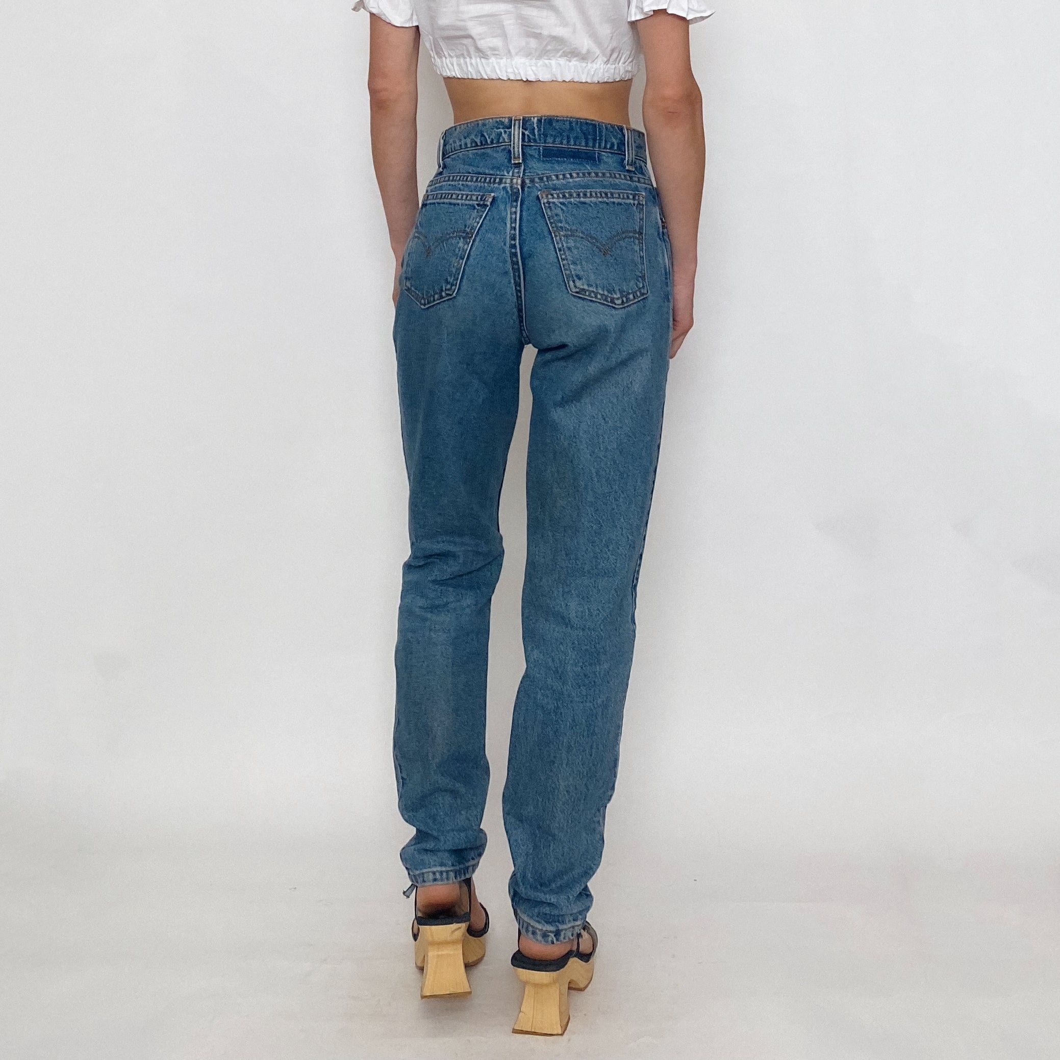 Vintage Levi's 950 High Rise Jeans in Medium Wash