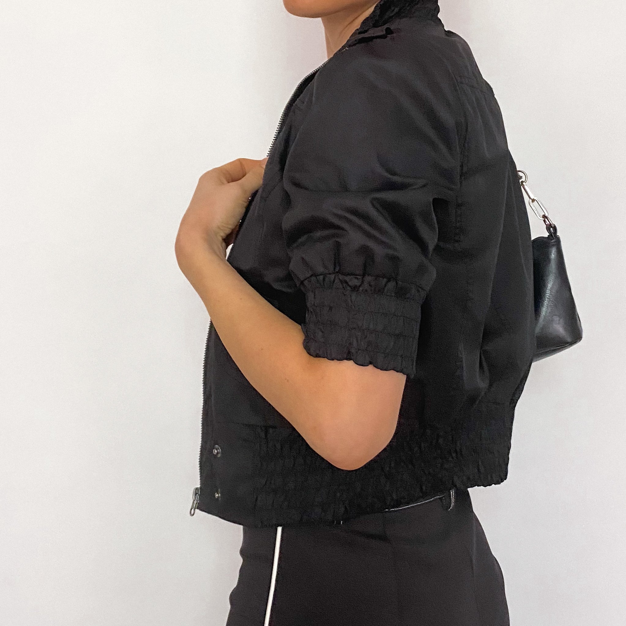 Bebe Black Short Sleeve Smocked Zip Up Top