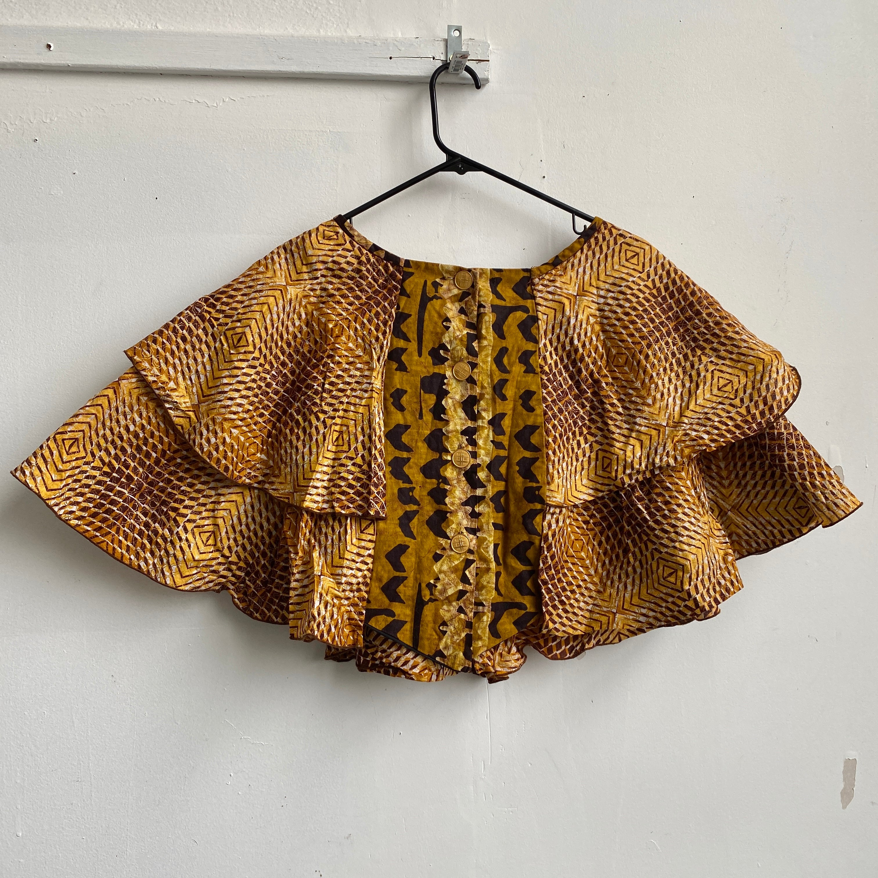 Brown print ruffle cape top