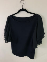 Black ruffle top