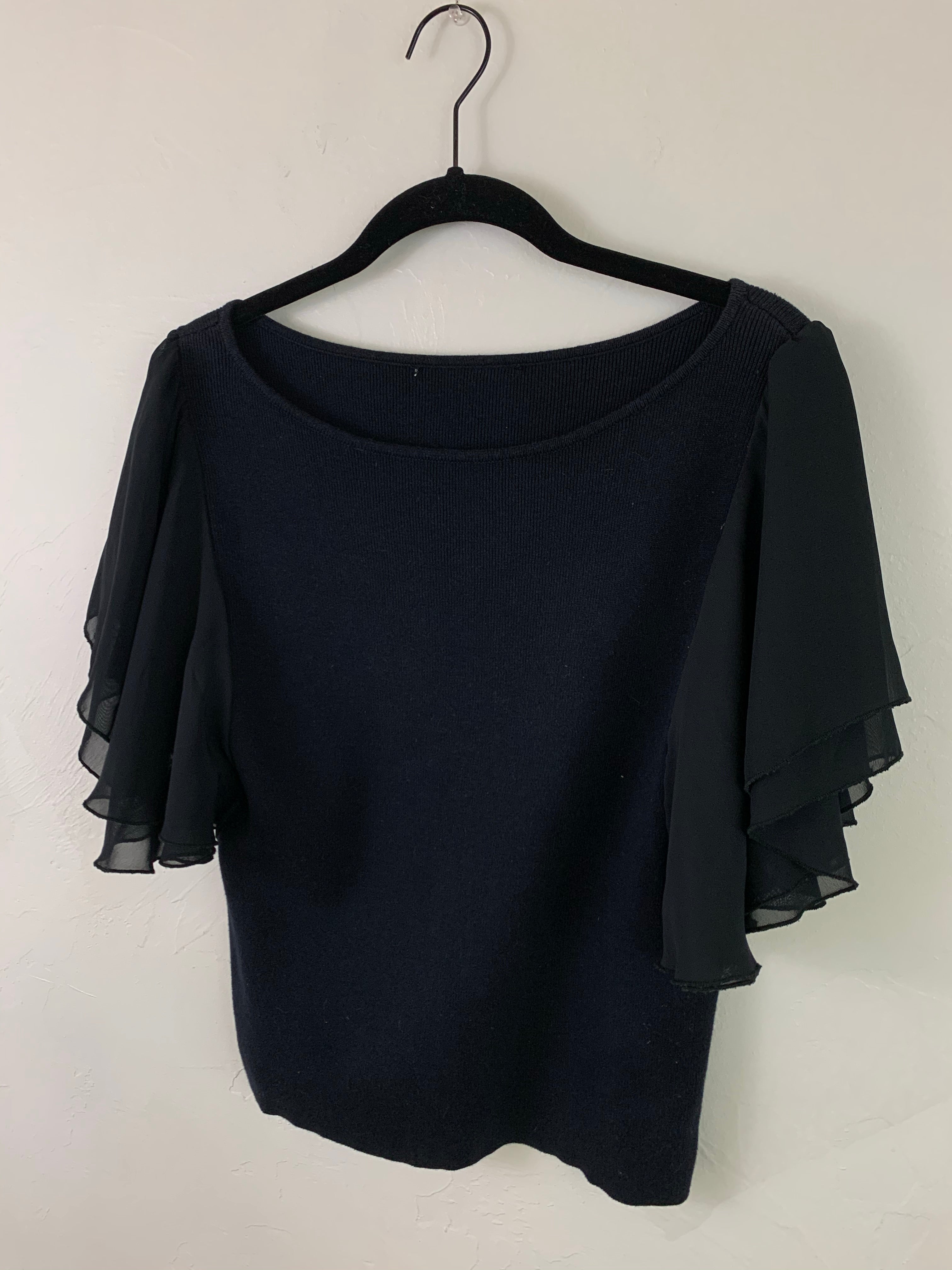 Black ruffle top