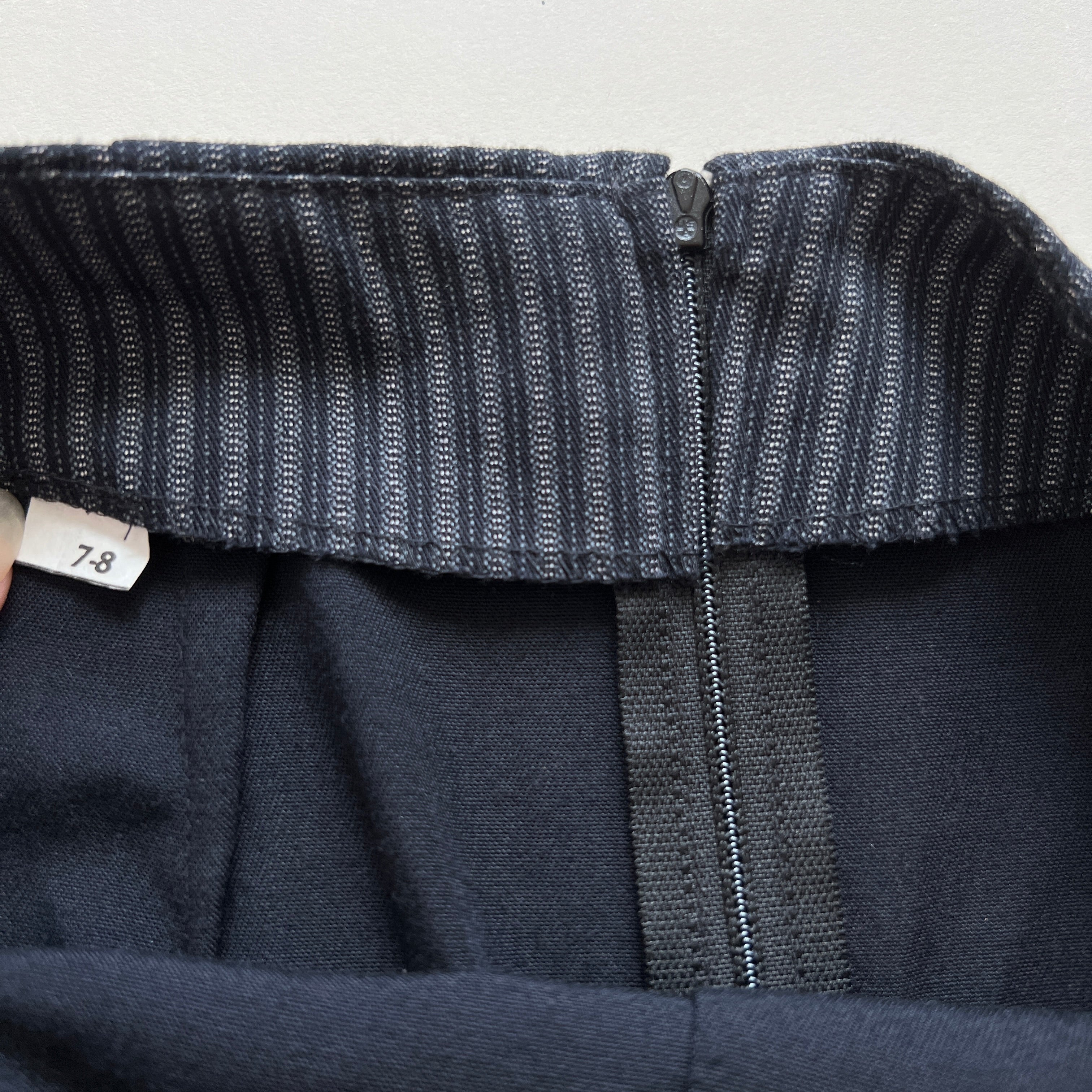 Navy pinstripe skirt suit