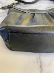 Soft black leather coach