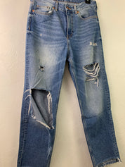 Distressed medium wash denim