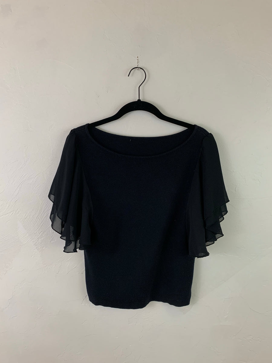Black ruffle top