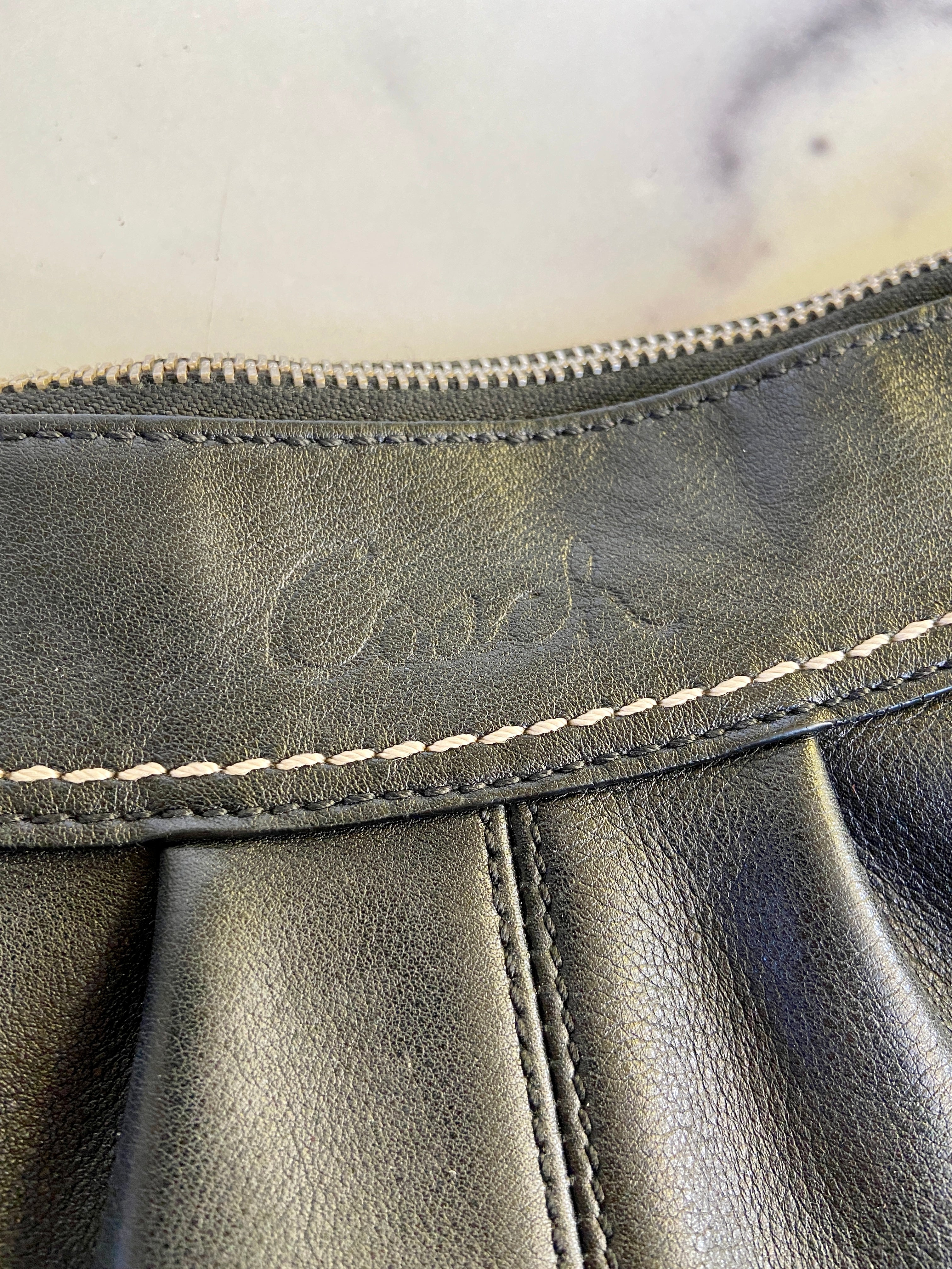 Soft black leather coach