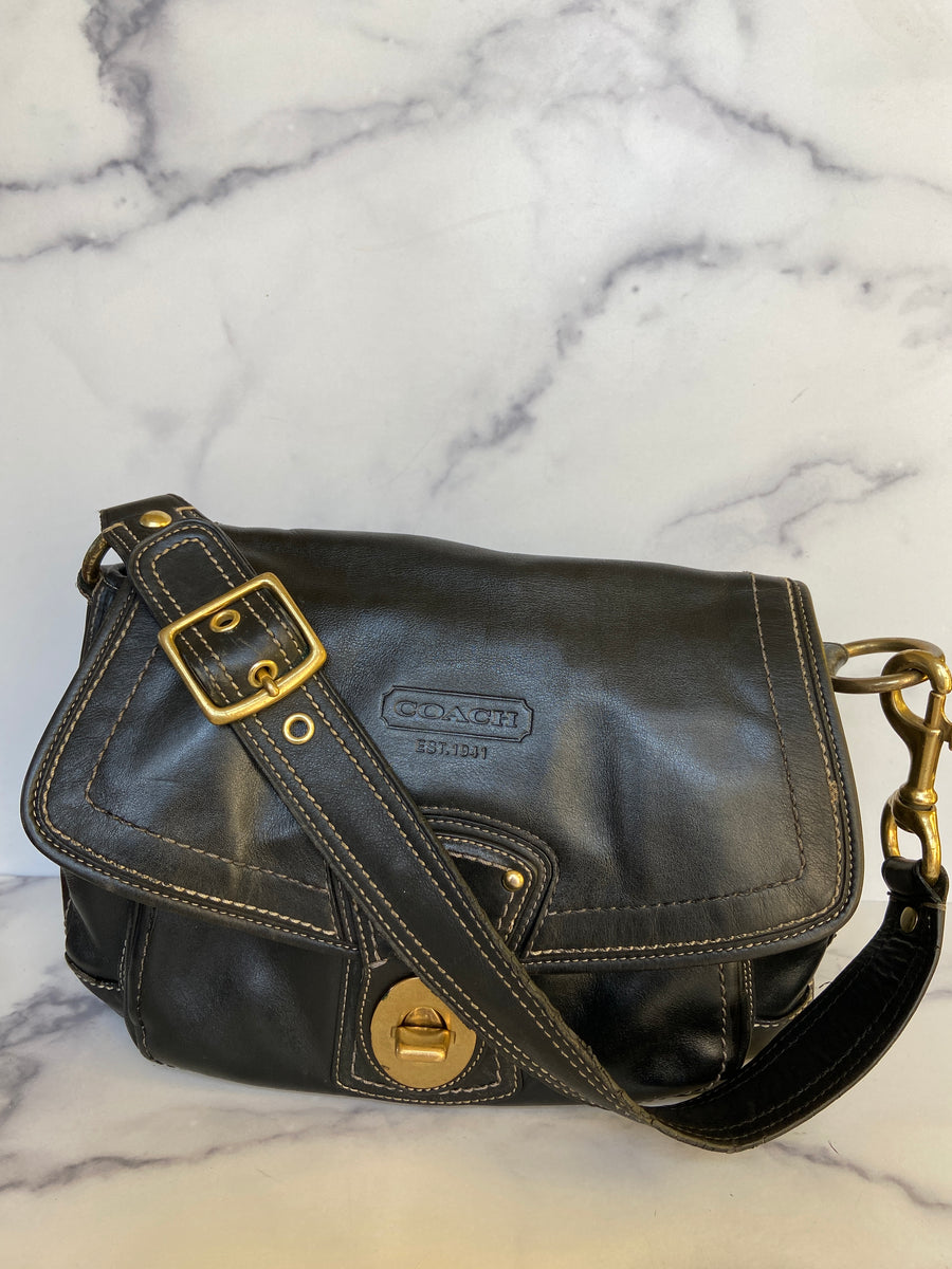Reworked black leather coach