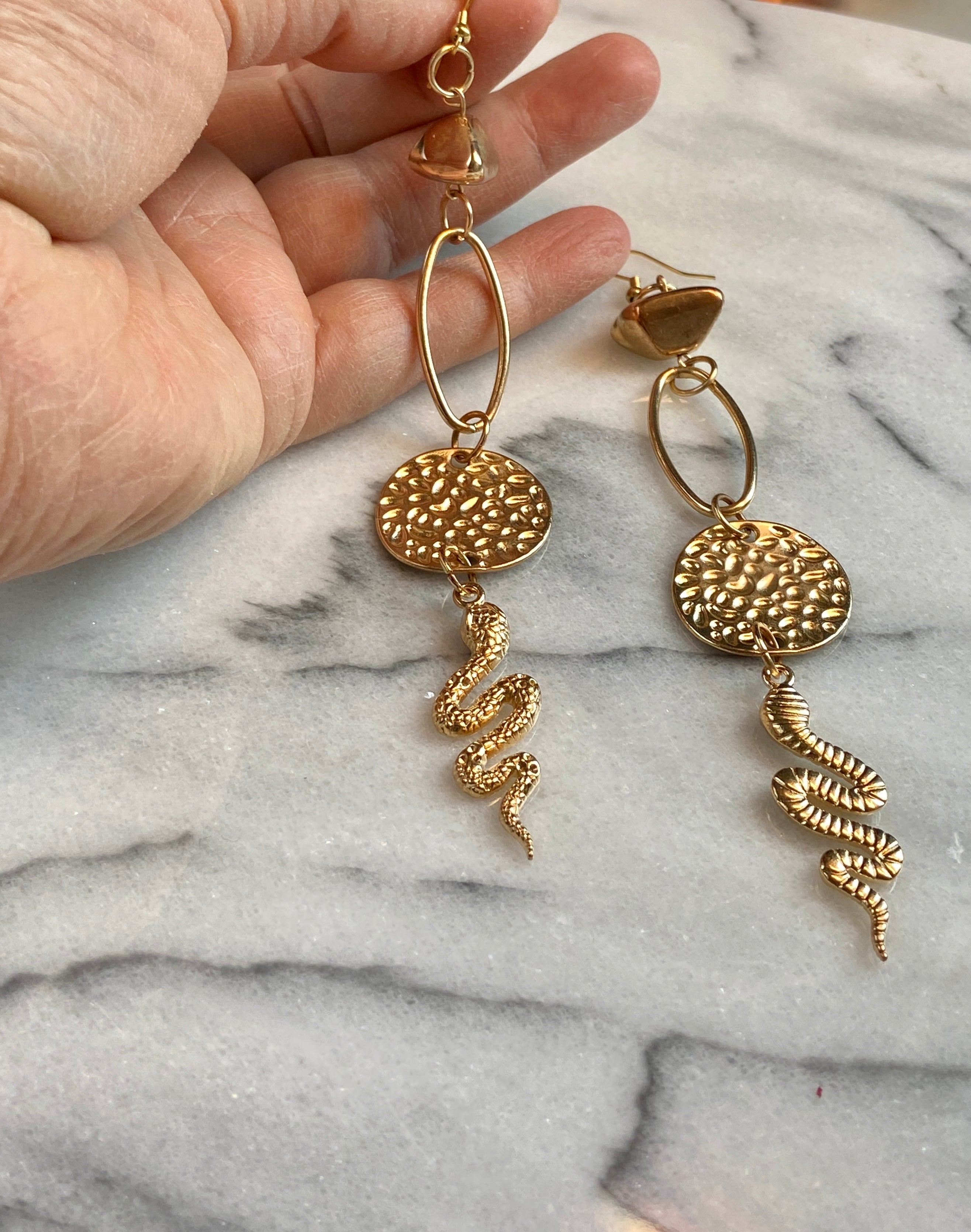 Long gold snack earrings