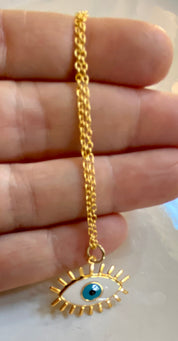 Black and gold evil eye