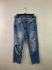 Distressed medium wash denim