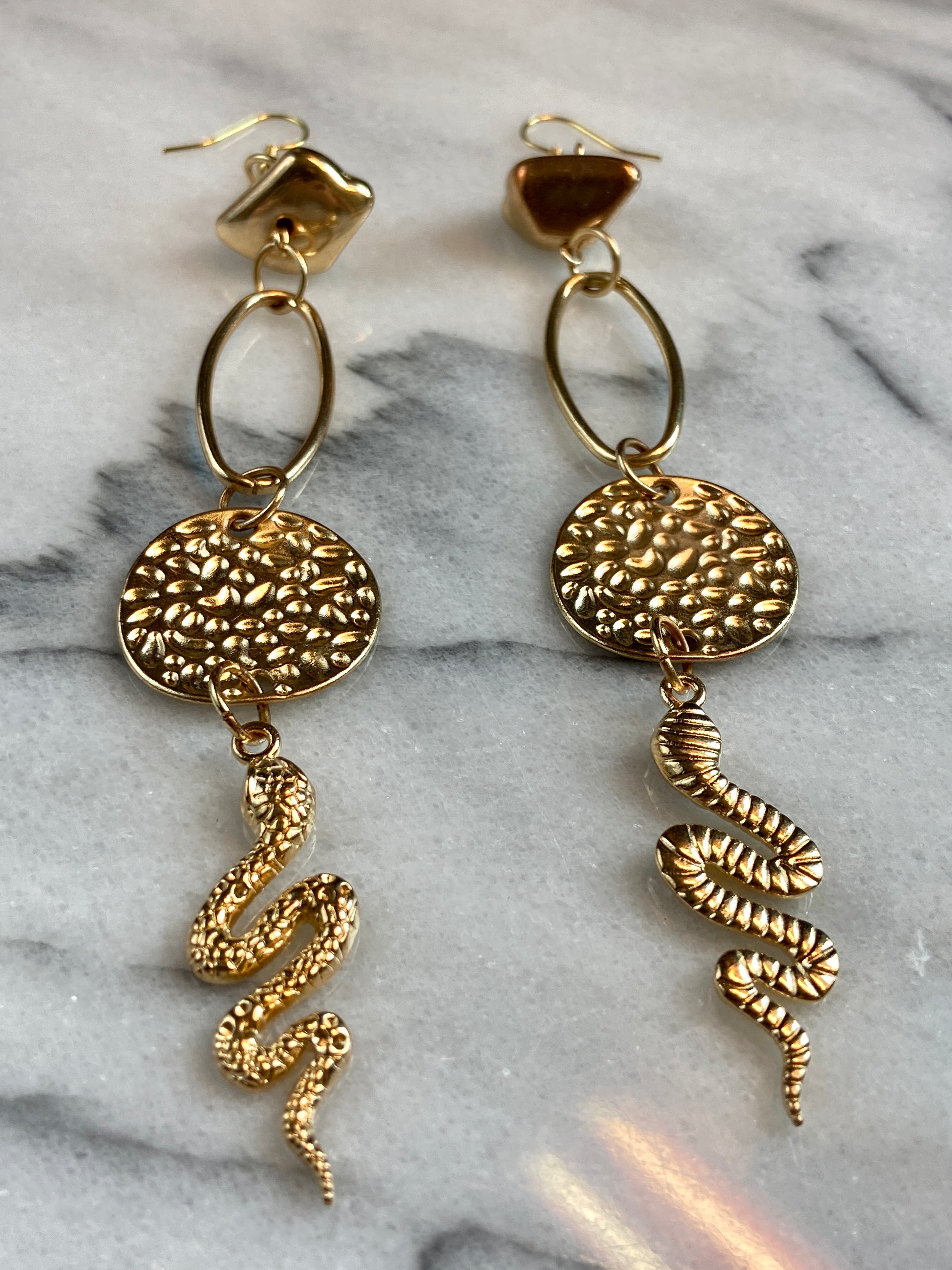 Long gold snack earrings