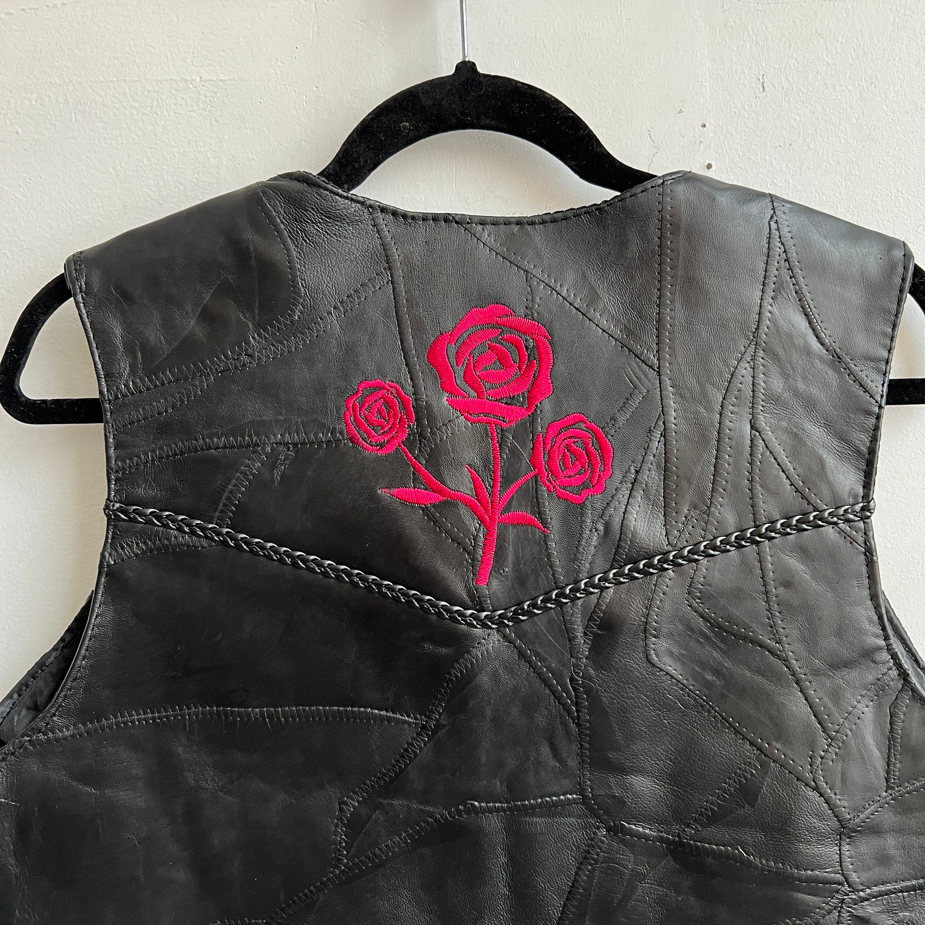 Black leather rose vest