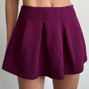 pleated plum mini skirt