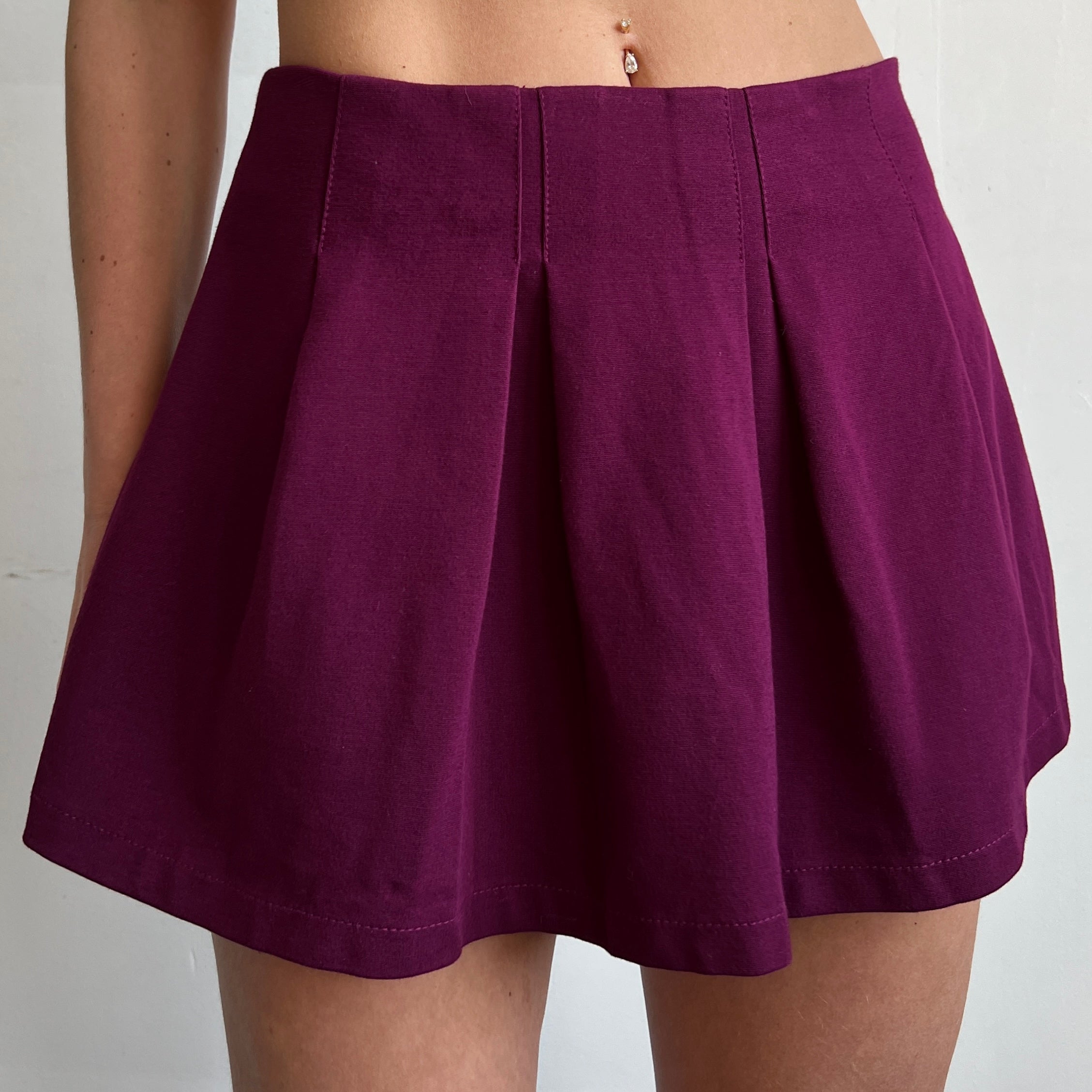 pleated plum mini skirt