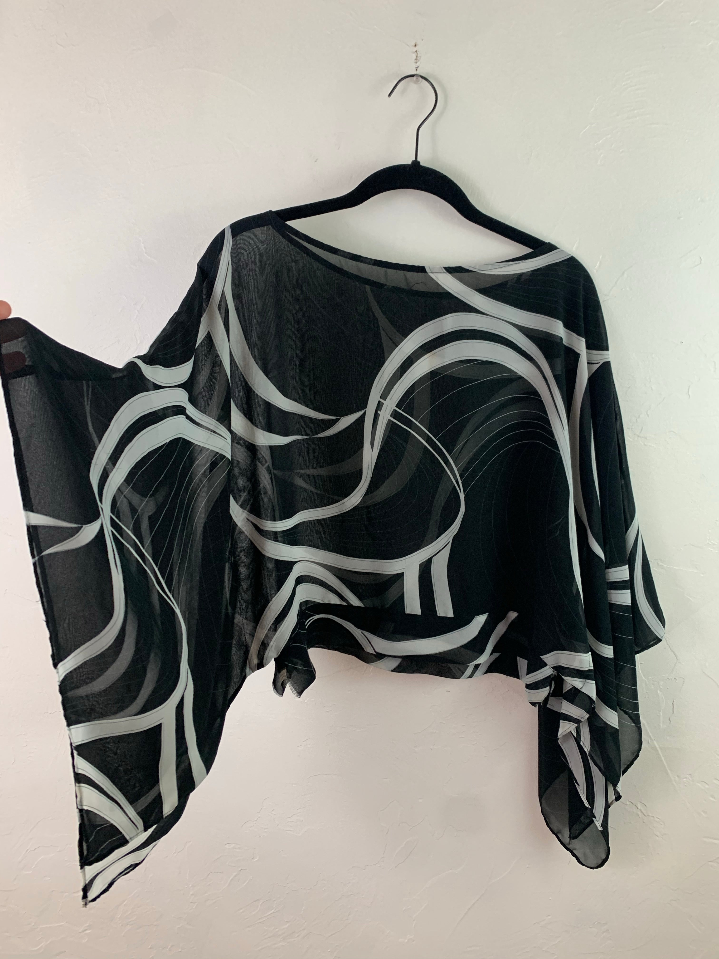 Sheer black poncho
