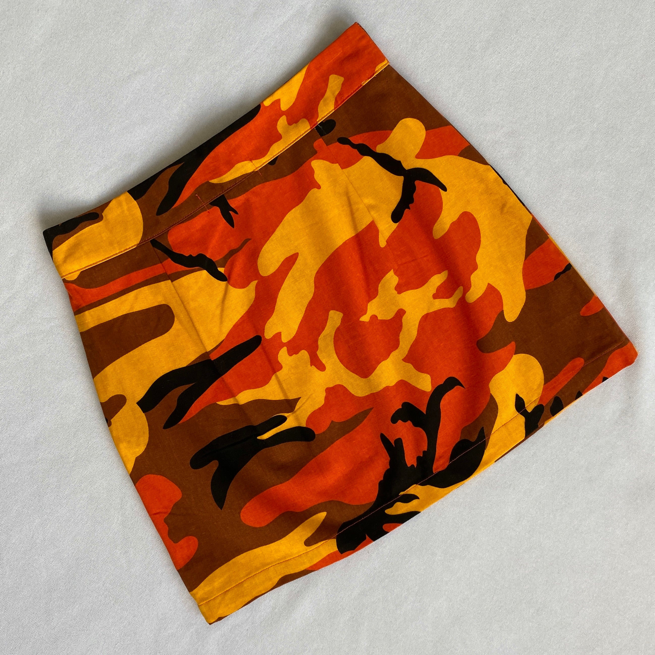 Orange camo mini skirt