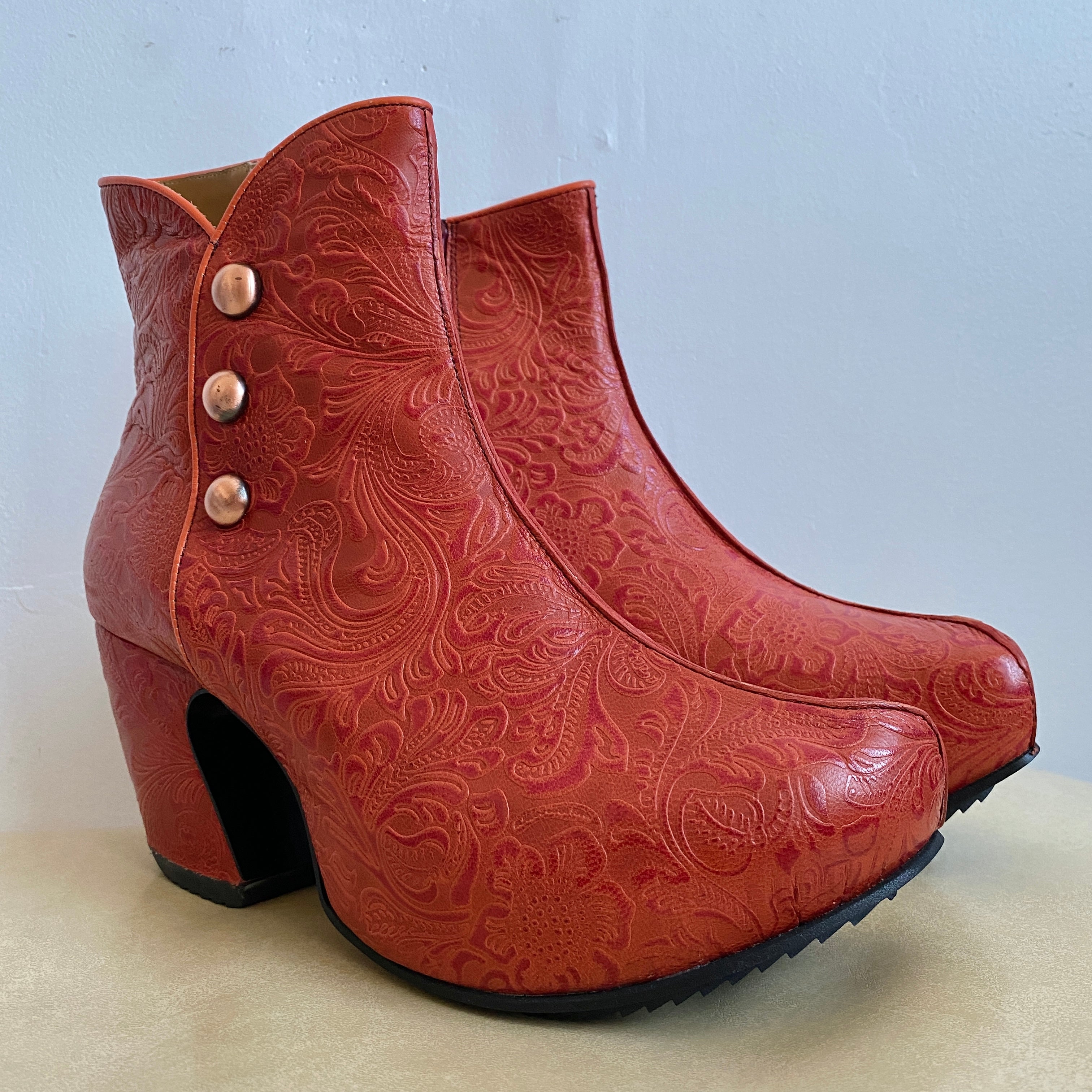 Burnt orange baroque platforms