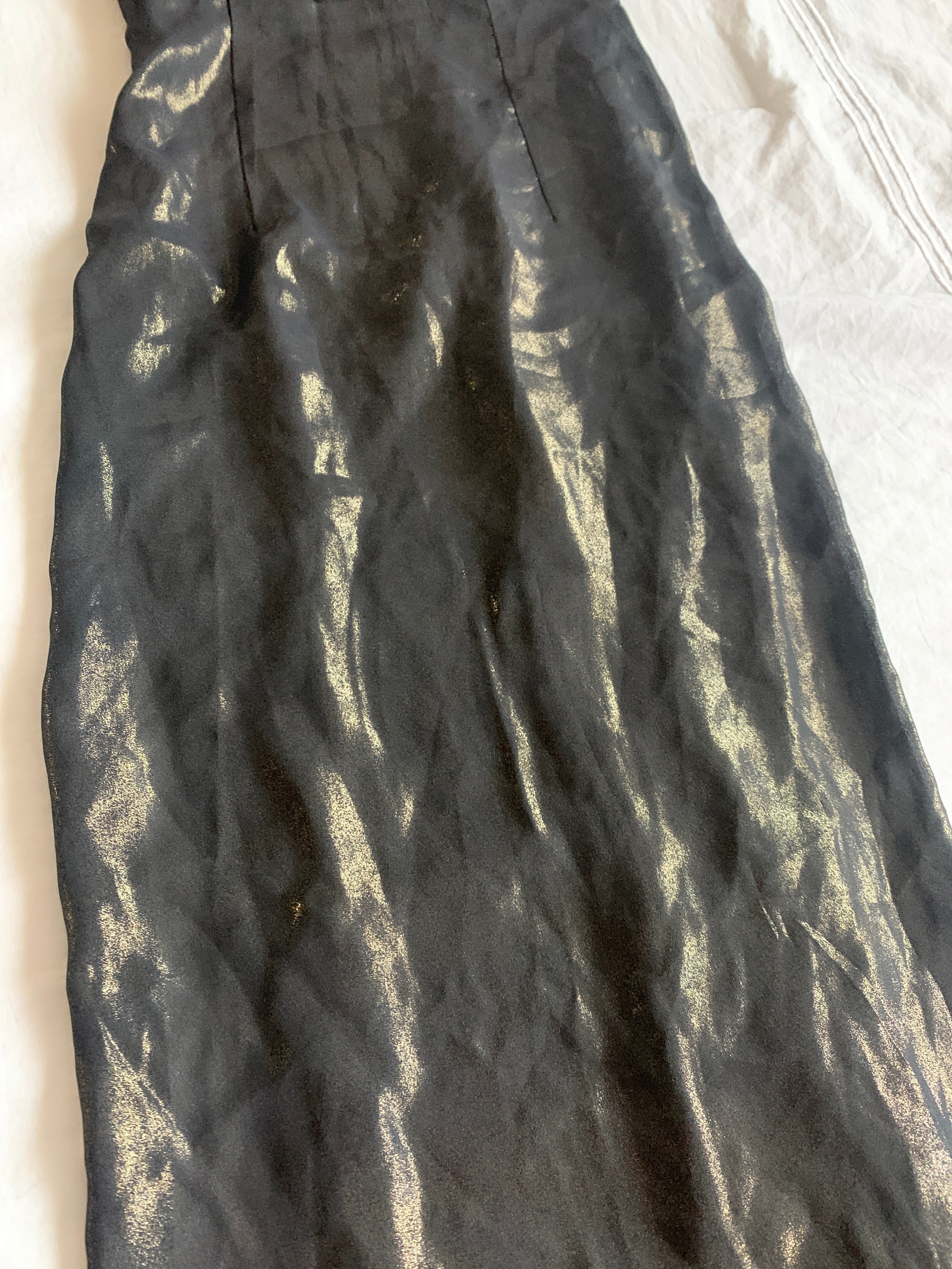 One shoulder layering piece