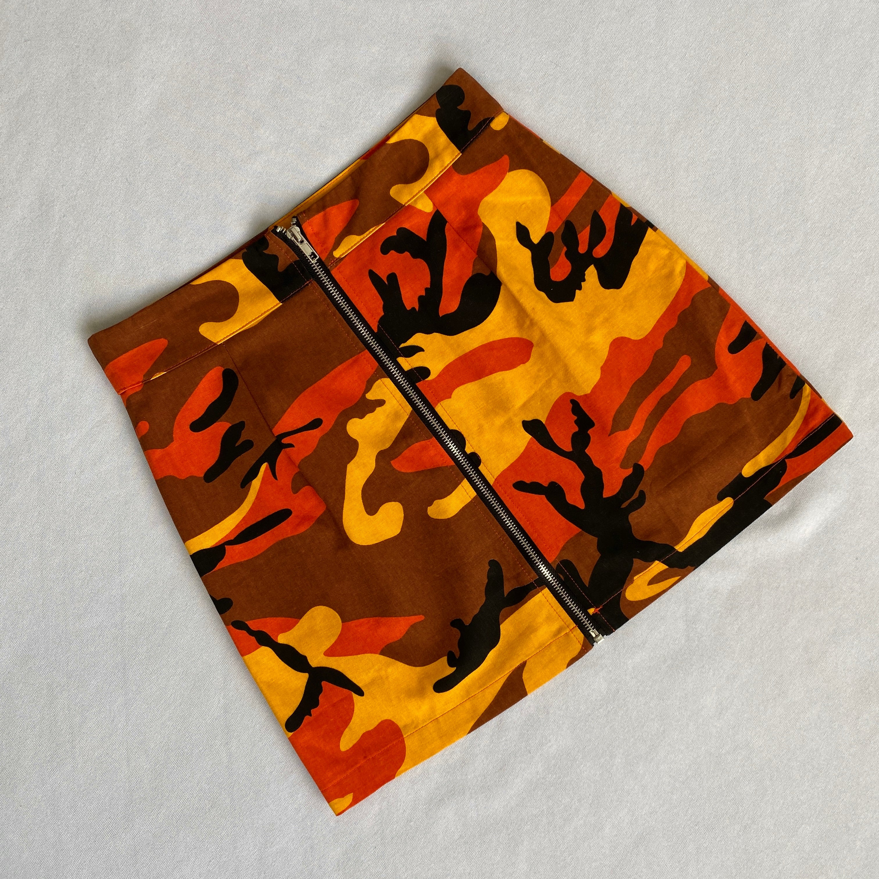 Orange camo mini skirt