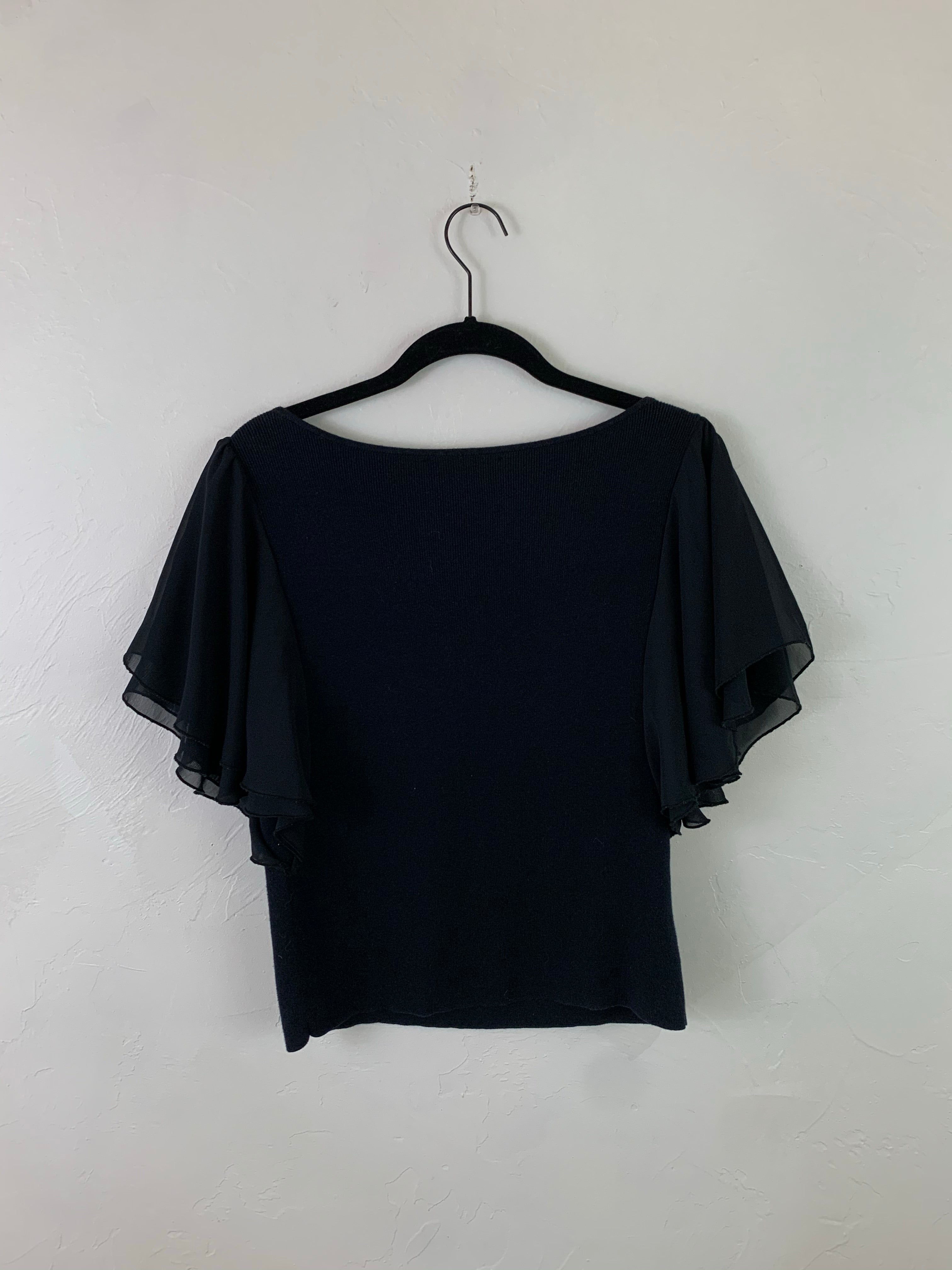 Black ruffle top