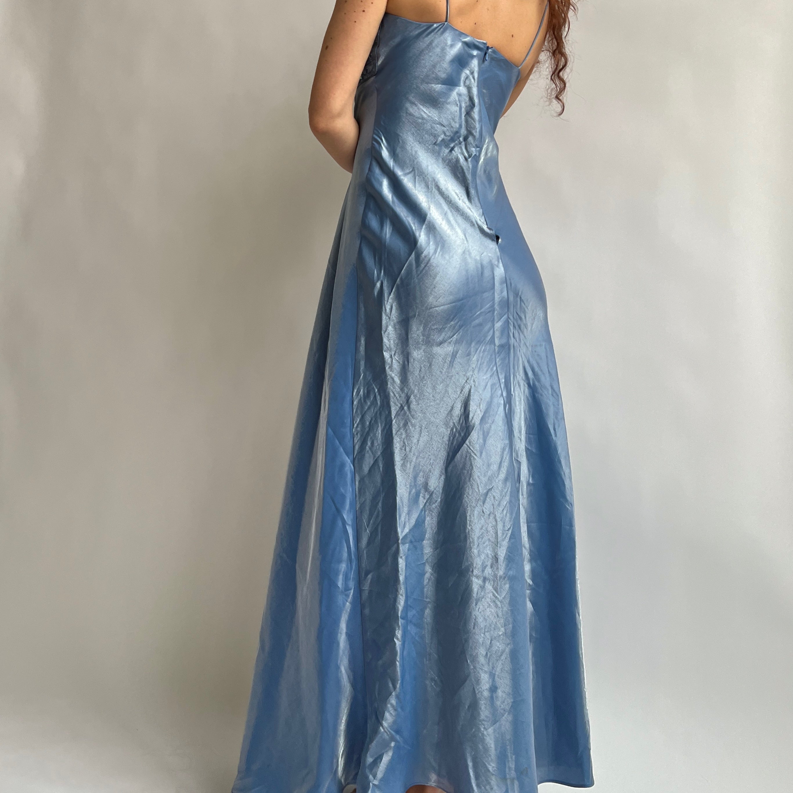 navy blue dress for baby girl Light Blue Prom Beautiful Inexpensive Dresses A Blue Ball Gown On A  Mannequin In Front Of main image 0