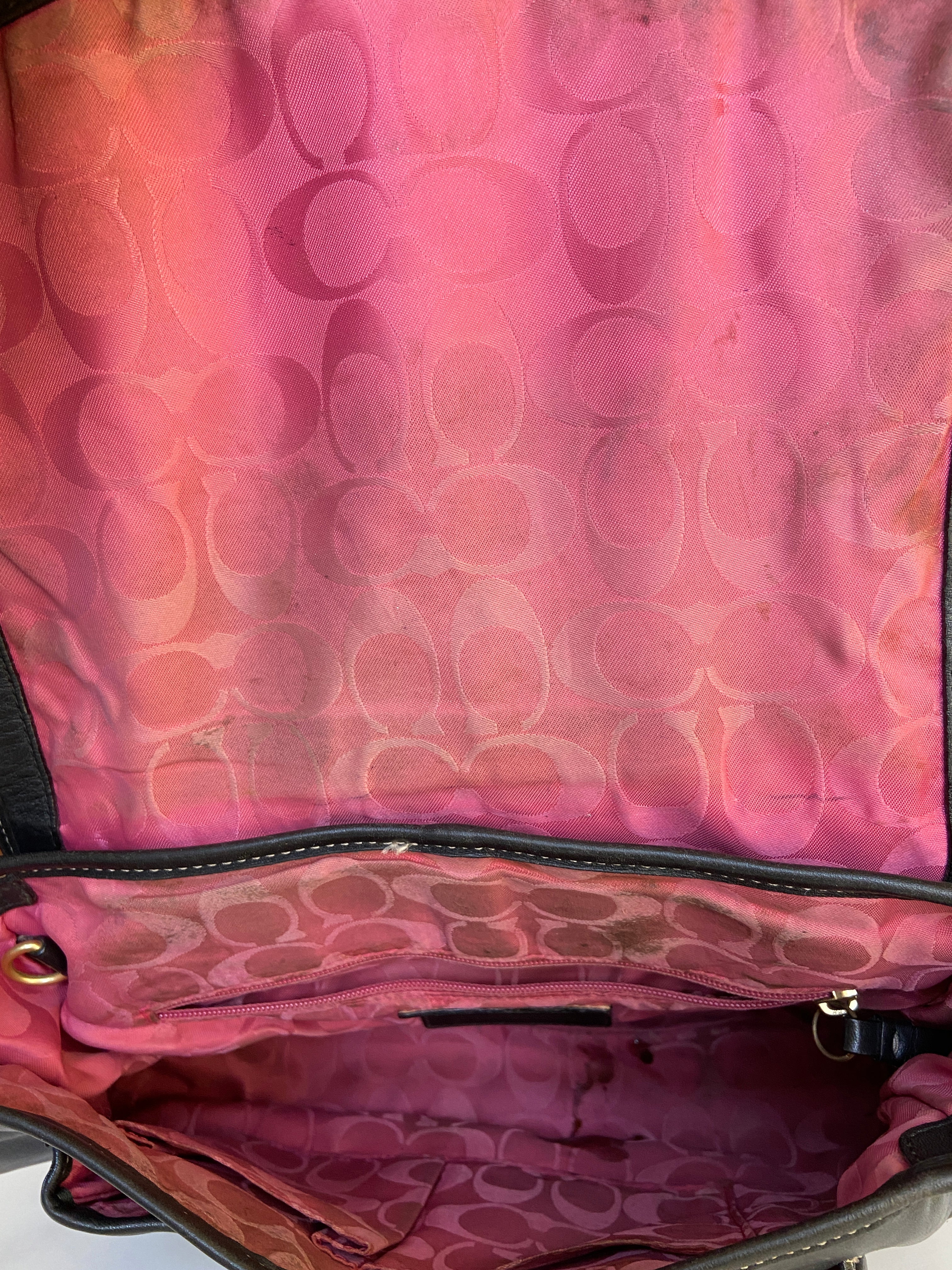 Reworked black leather coach