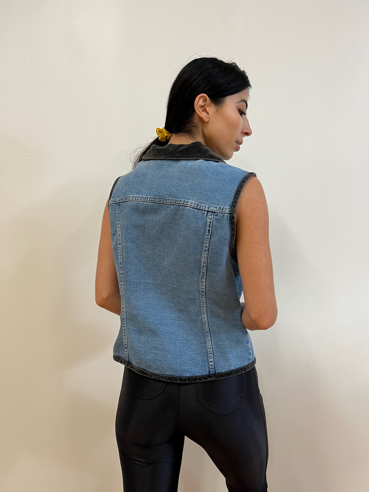 Black and blue denim vest