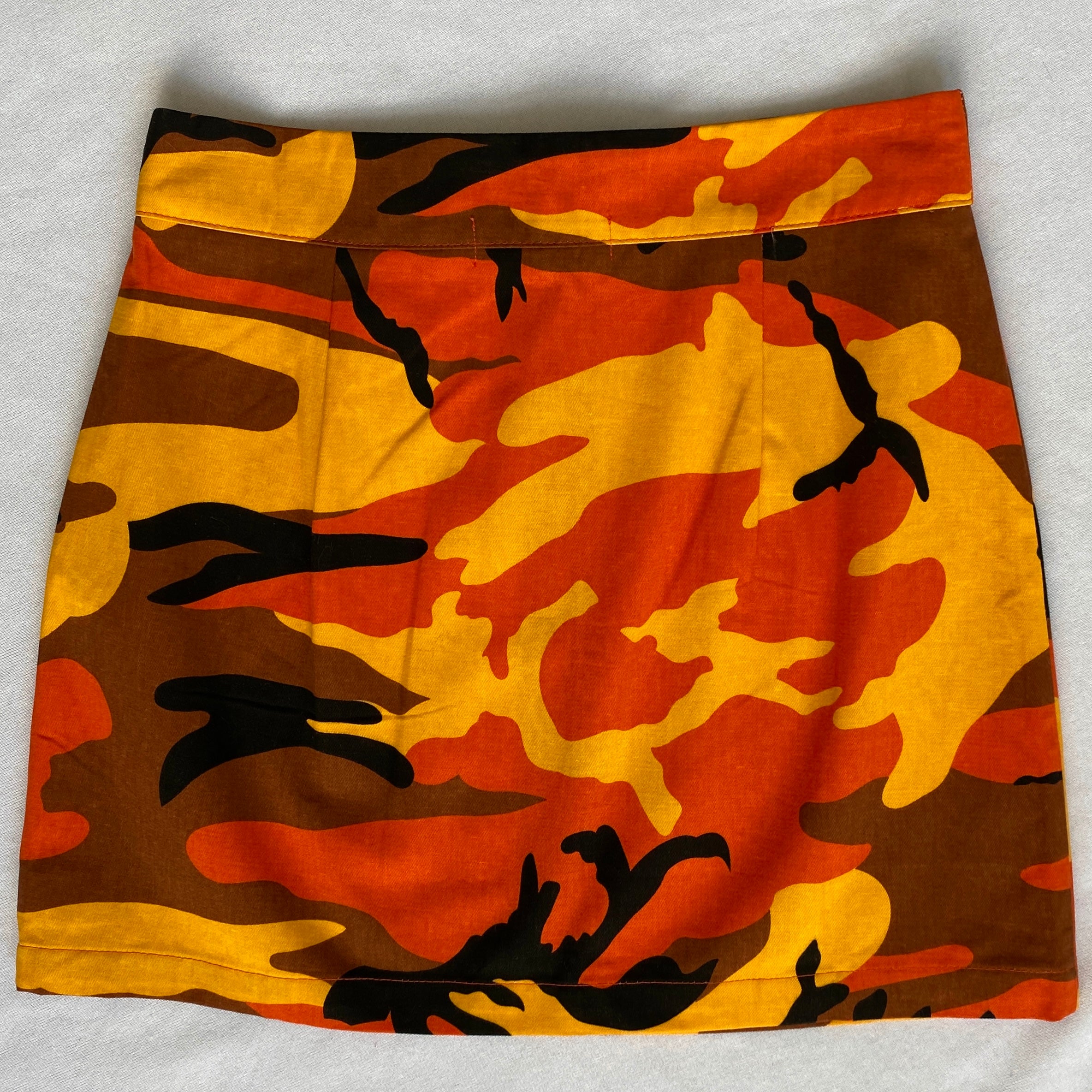 Orange camo mini skirt