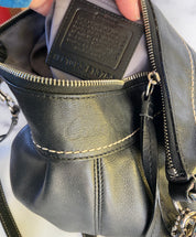 Soft black leather coach