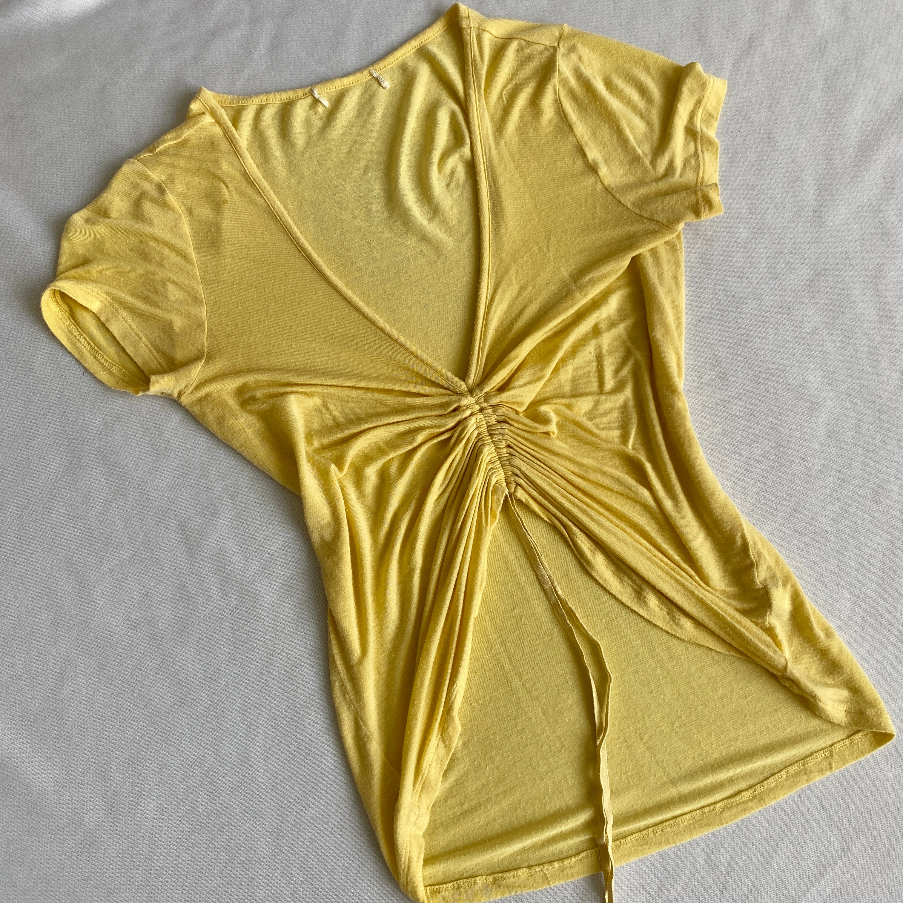 yellow cinched t-shirt