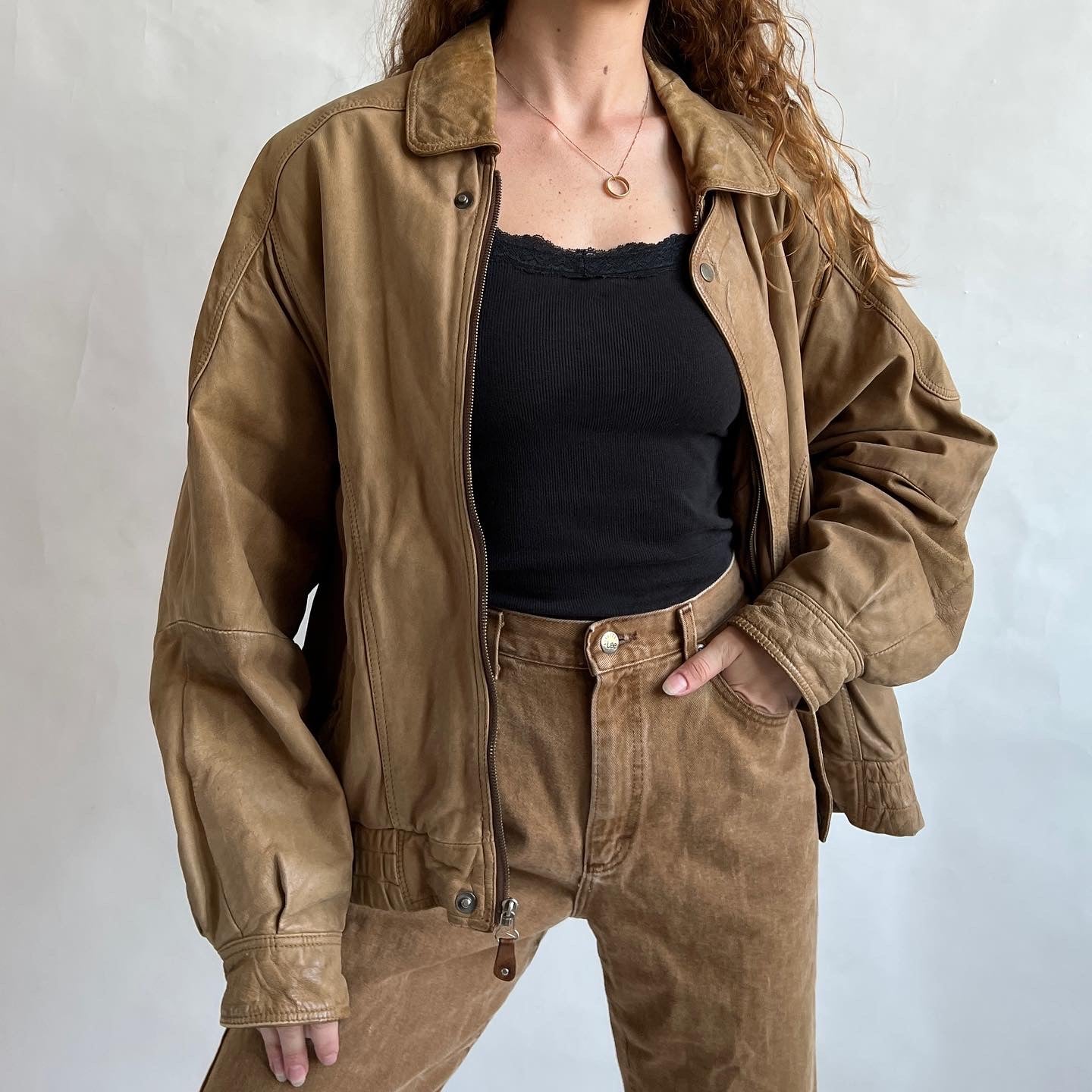 Vintage tan leather bomber