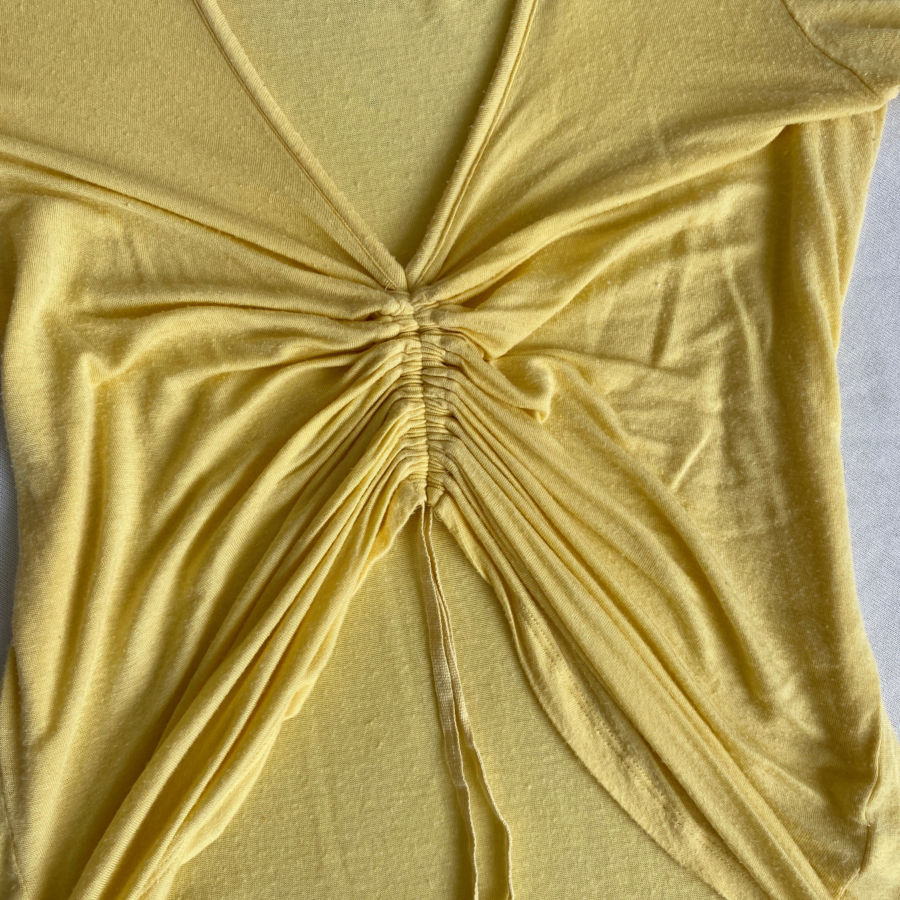 yellow cinched t-shirt