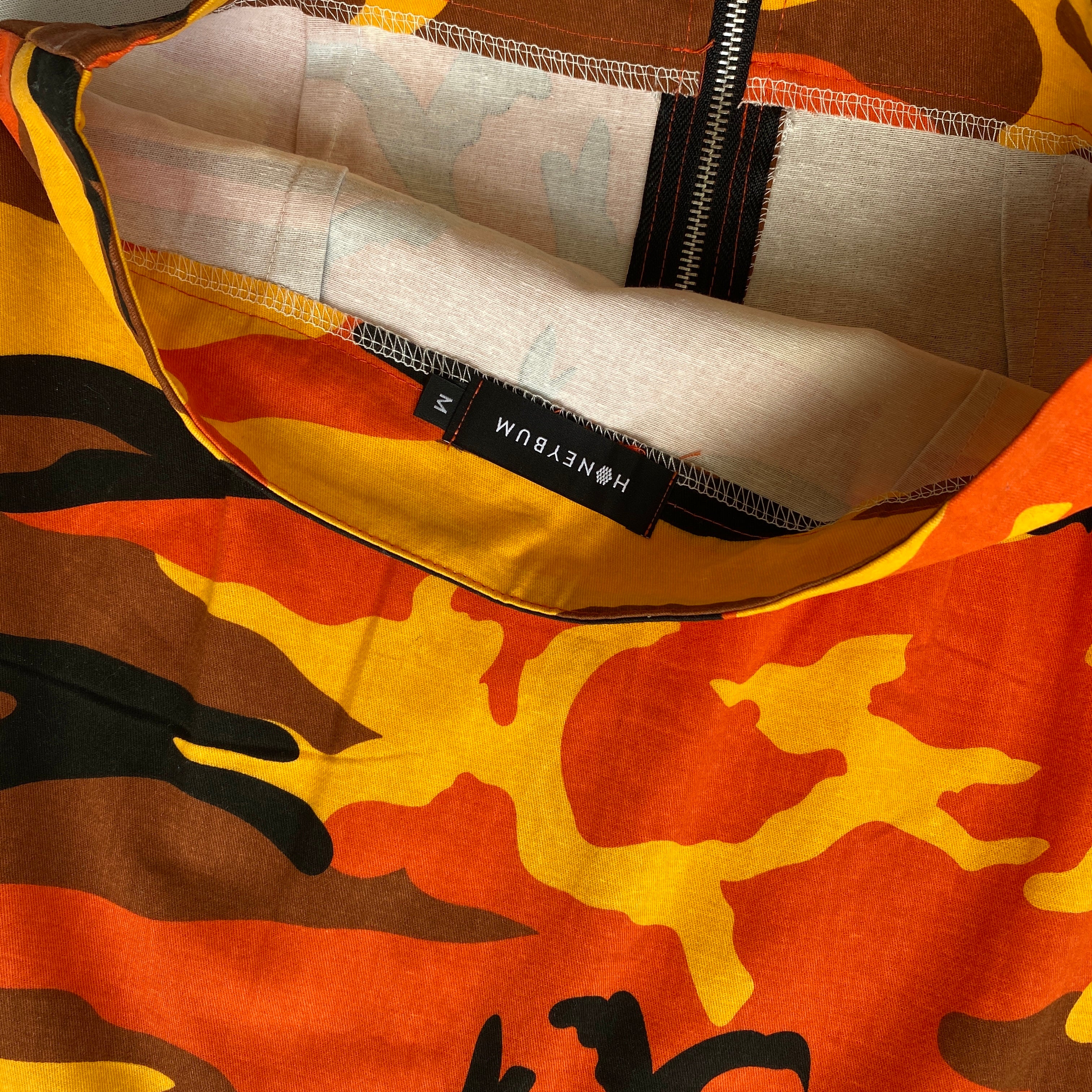 Orange camo mini skirt